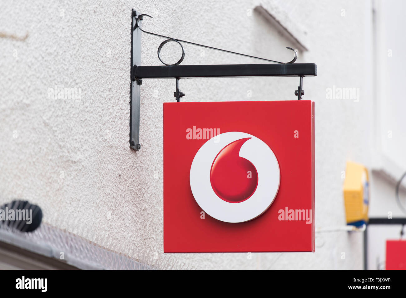 A Vodafone shop sign logo. Stock Photo