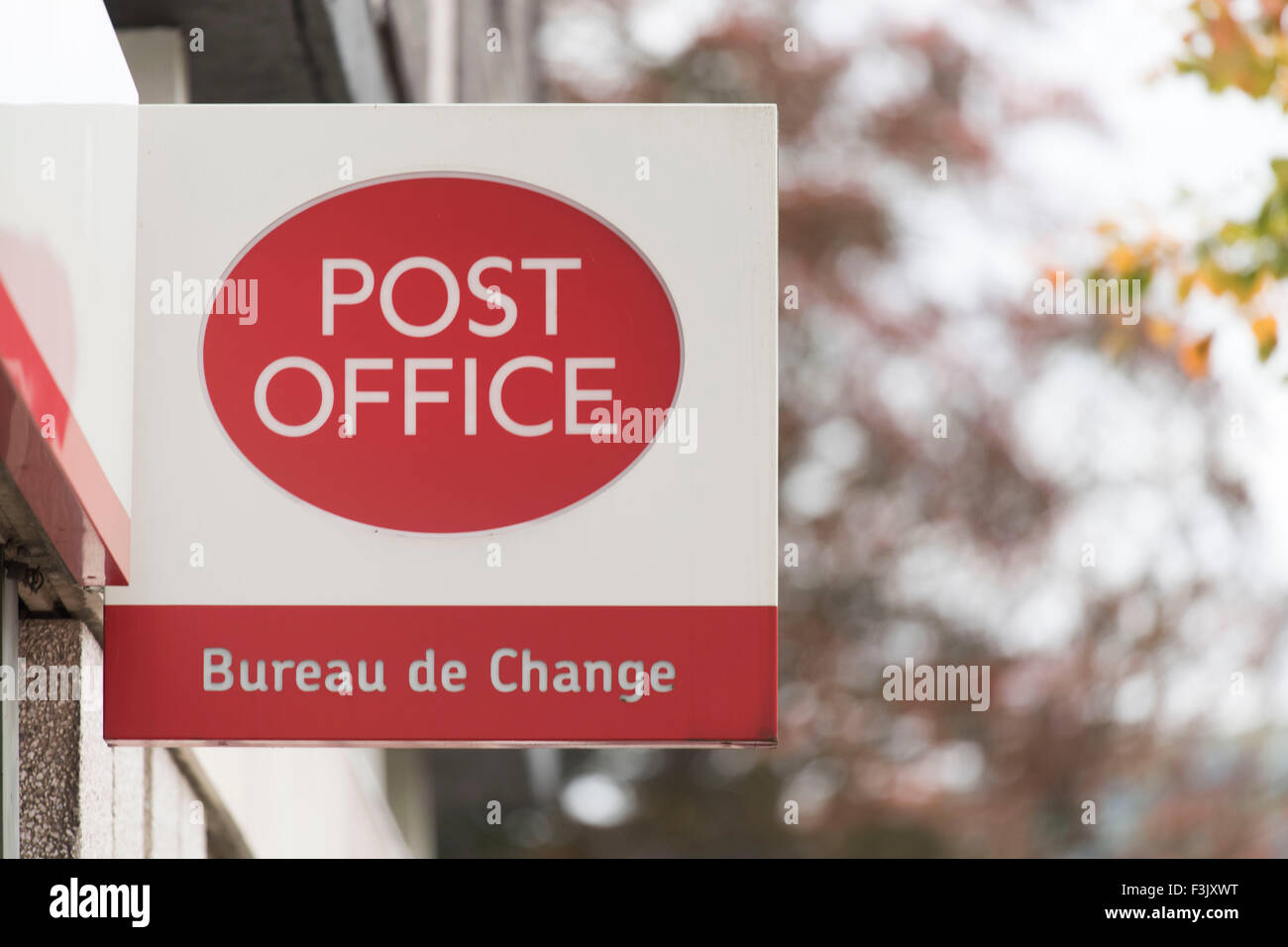 A Post Office sign for a store with a currency exchange for travel money Stock Photo