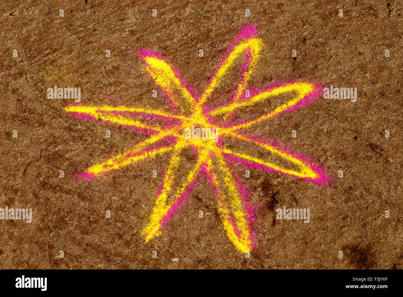 Star Floor Design Drawn With Colored Powder On Cow Dung Flooring