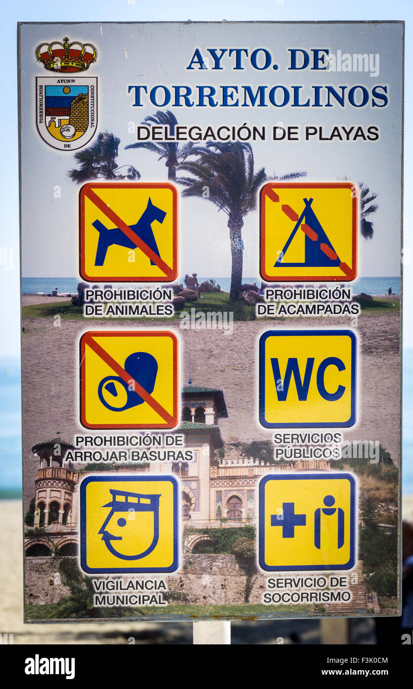 An instruction and information sign in Spanish on the beach at Torremolinos, Spain. Stock Photo