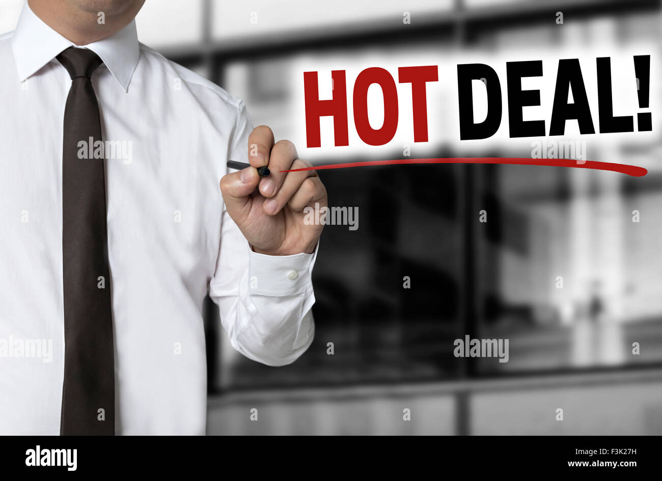 Hot deal is written by businessman background concept Stock Photo