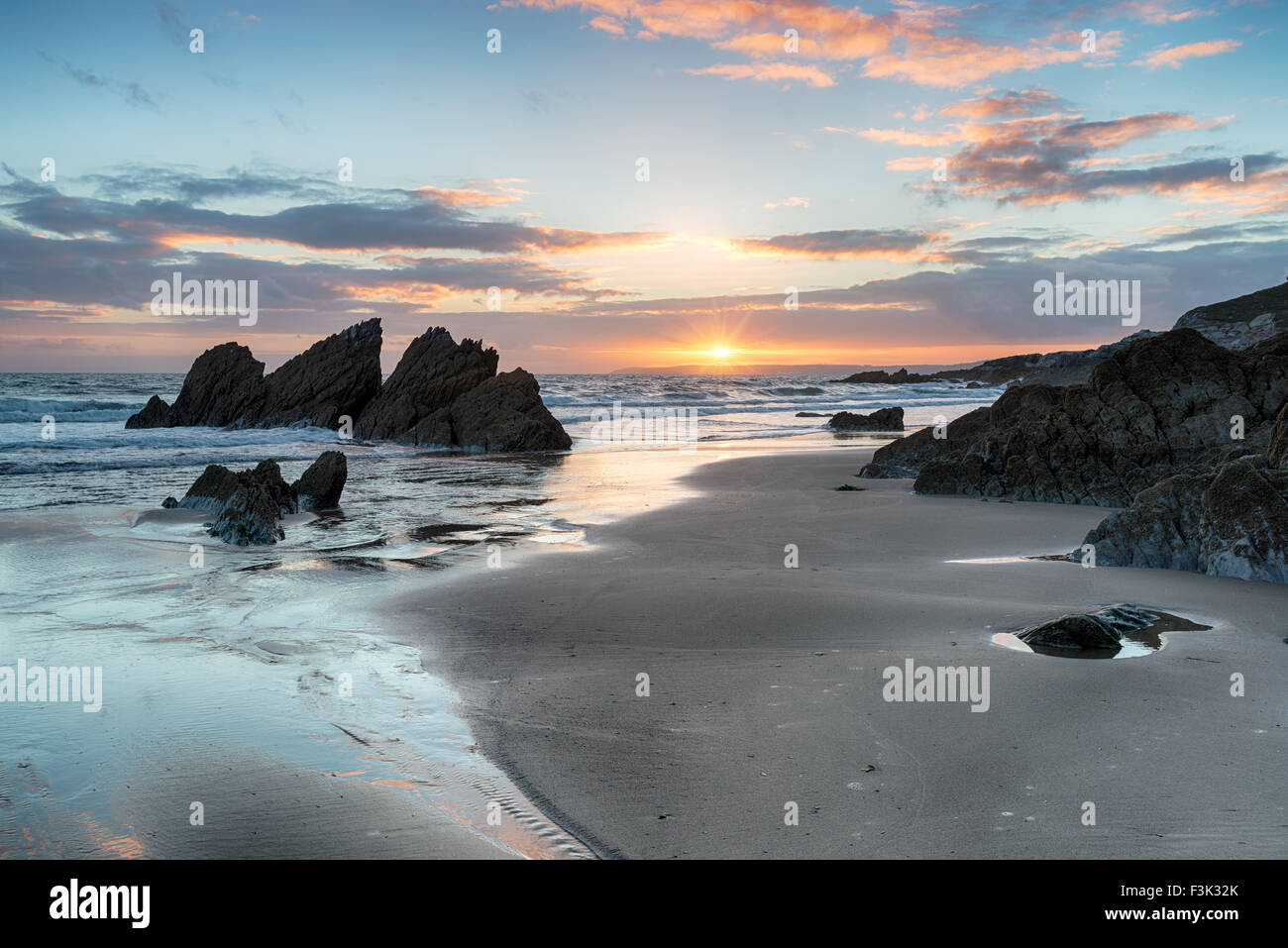 Beautifull sunset on the beach at Freathy in Whitsand bay on the south coast of Cornwall Stock Photo