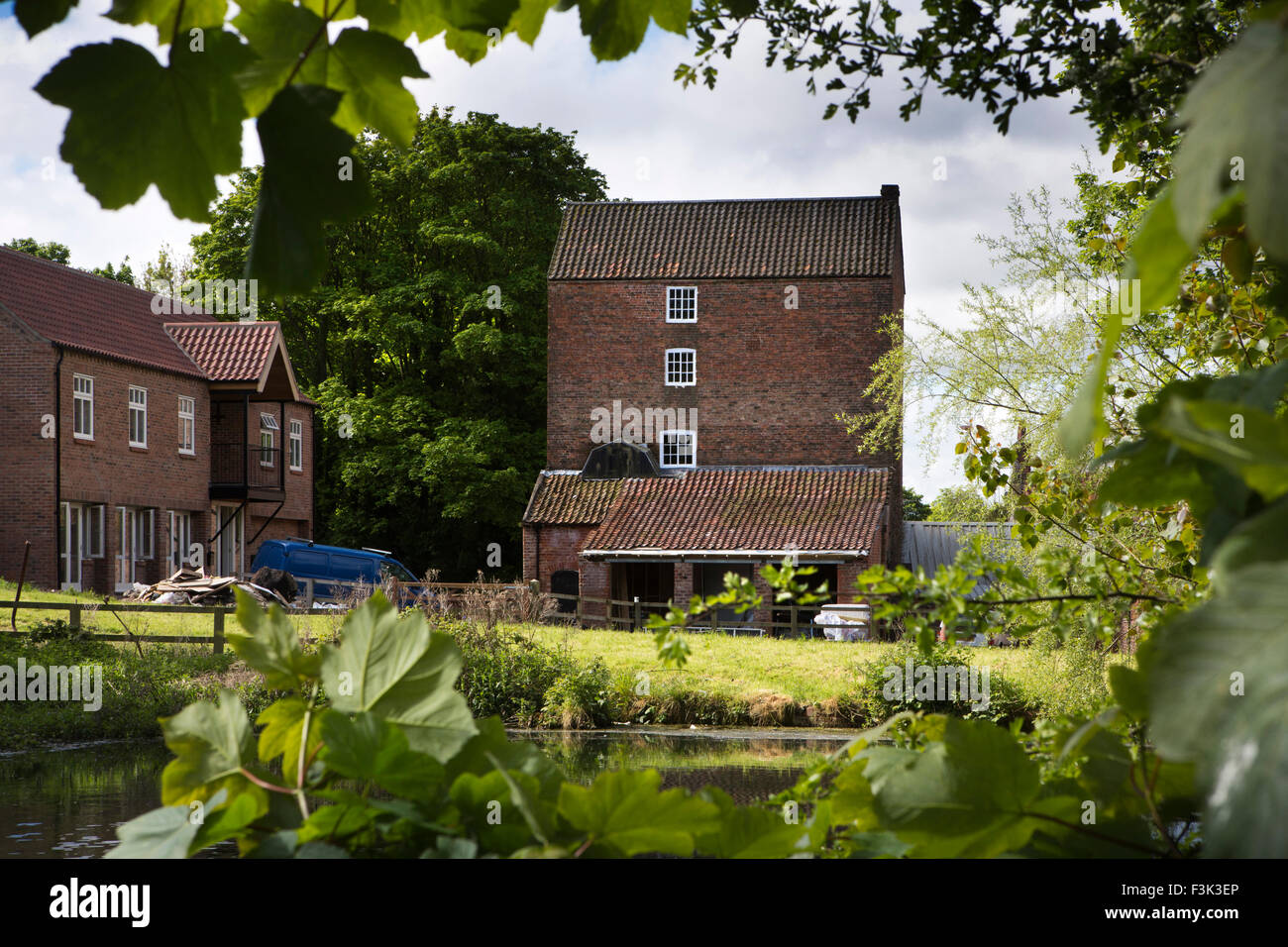 UK, England, Yorkshire East Riding, Welton, mill and new build house on