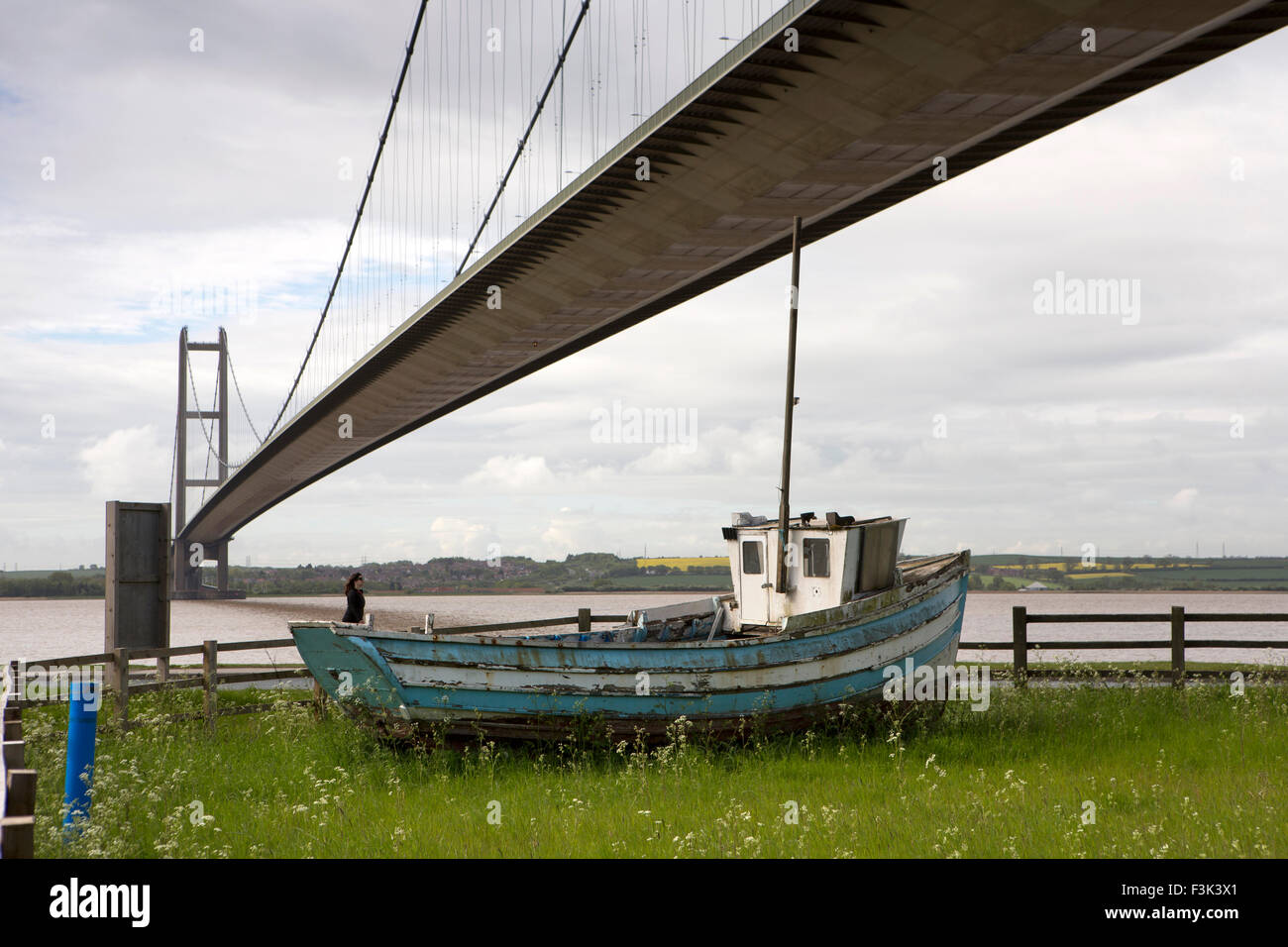 UK, England, Yorkshire East Riding, Hessle, old fishing boat below Humber Suspension Bridge Stock Photo