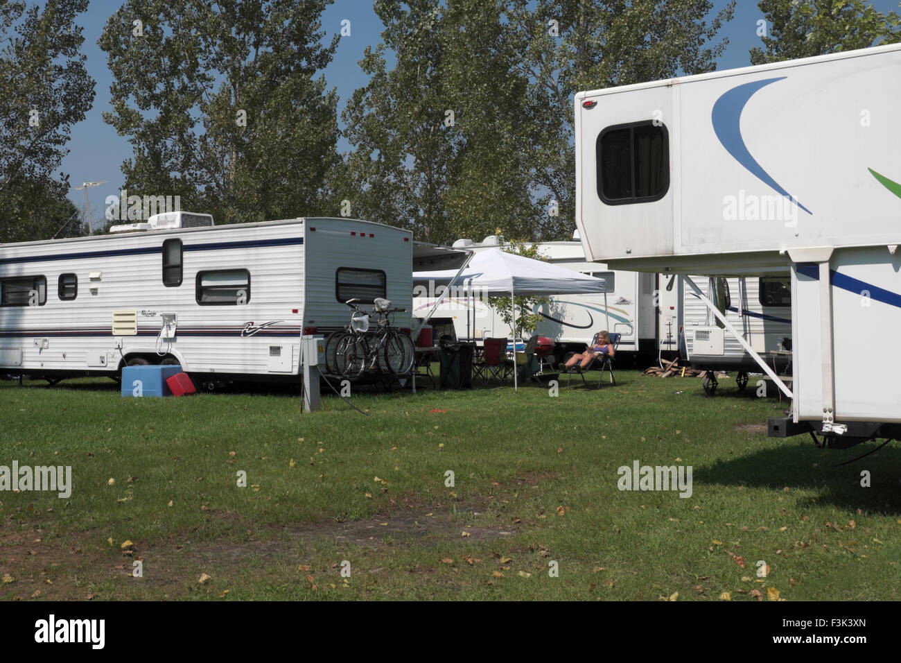 Woman relaxing at an RV park in midMichigan, USA Stock Photo Alamy