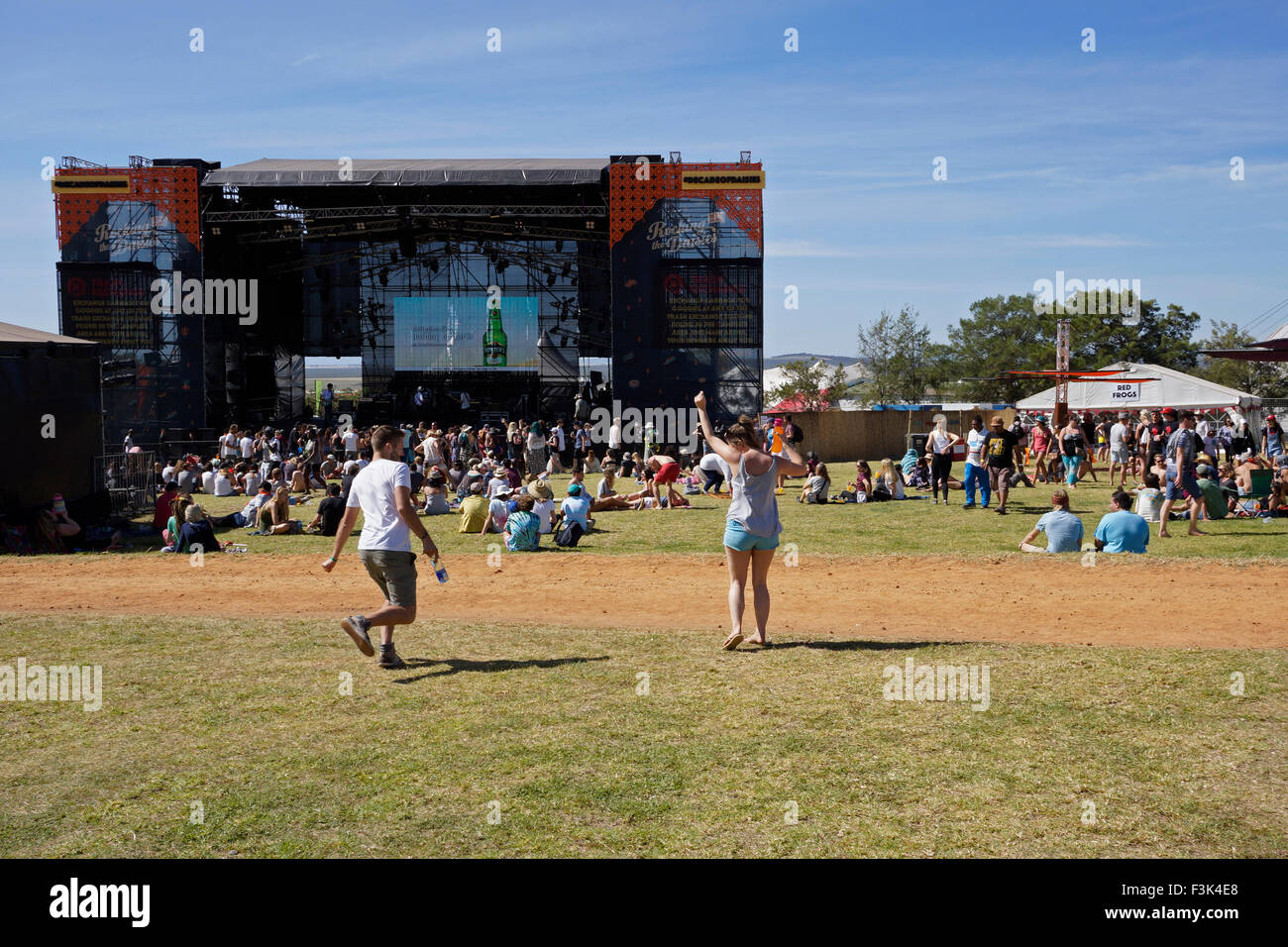 Festival goers dancing at the 2015 'Rocking the Daisies ' outdoor music festival in Darling, Western Cape, South Africa. Stock Photo