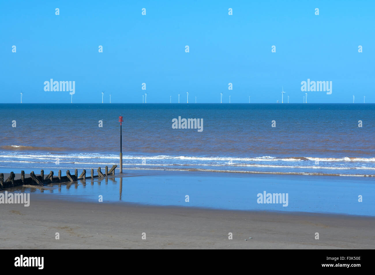 Withersea Seafront looking out towards the Westermost Rough Offshore Windfarm - Yorkshire, England, UK Stock Photo