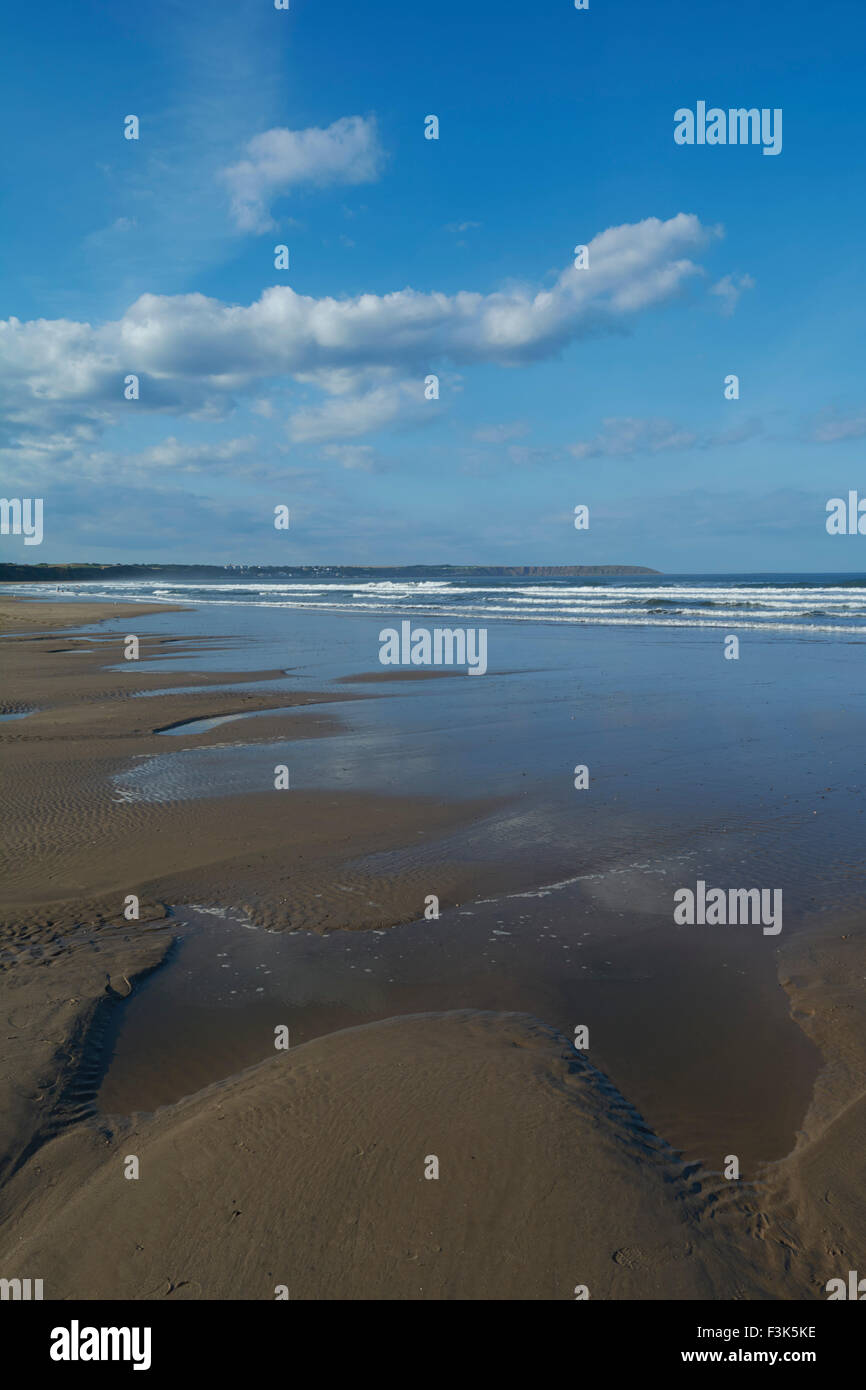 Blue sky day on the beach at Hunmanby Gap Yorkshire, England, UK