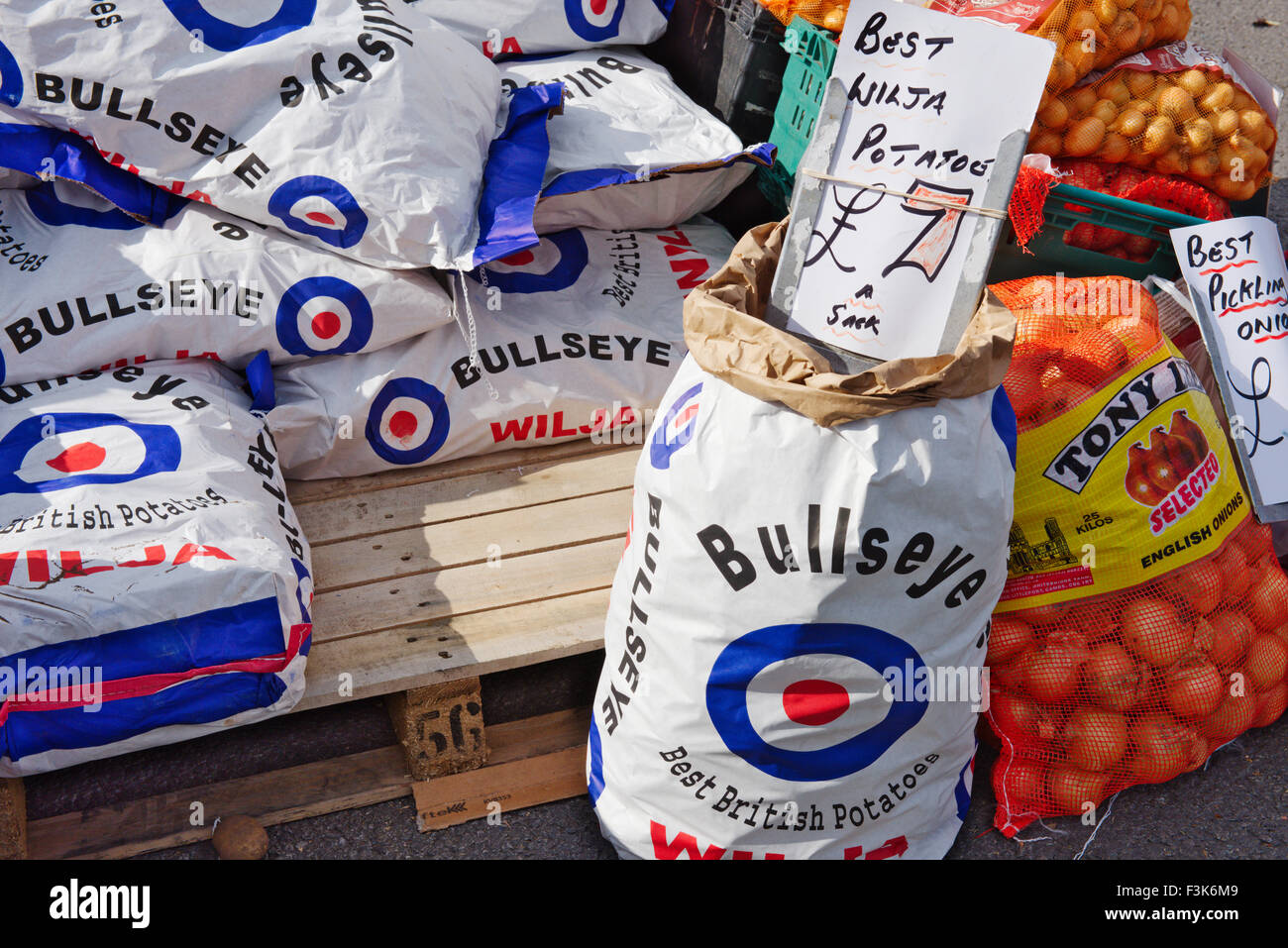 Sacks of British potatoes and English onions at open air market in Bristol, England Stock Photo