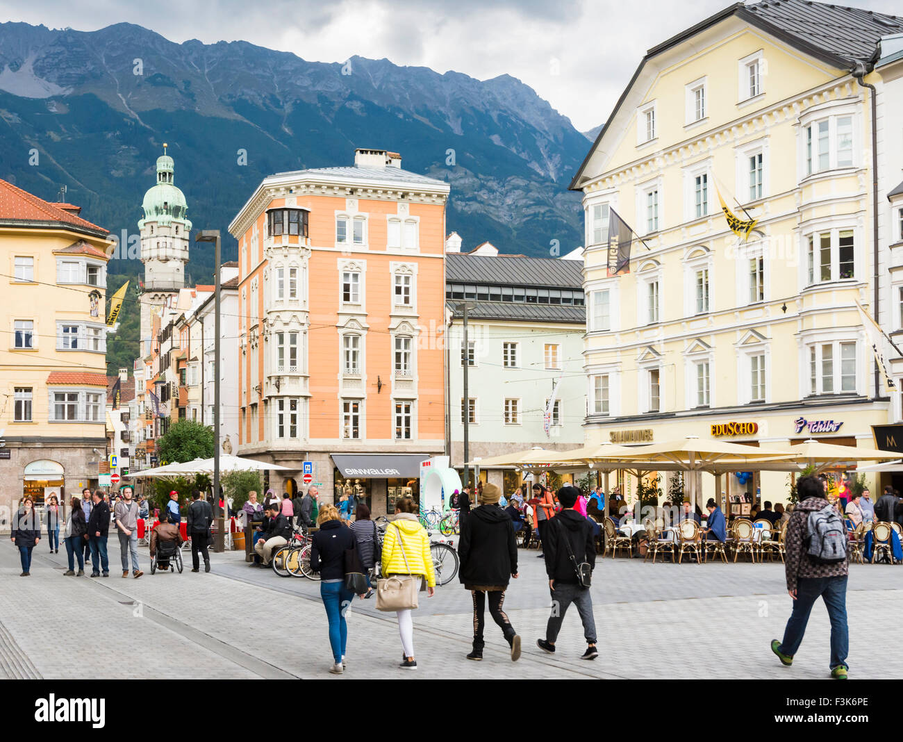 INNSBRUCK, AUSTRIA - SEPTEMBER 22: Tourists in the pedestrian area of Innsbruck, Austria on September 22, 2015. Stock Photo