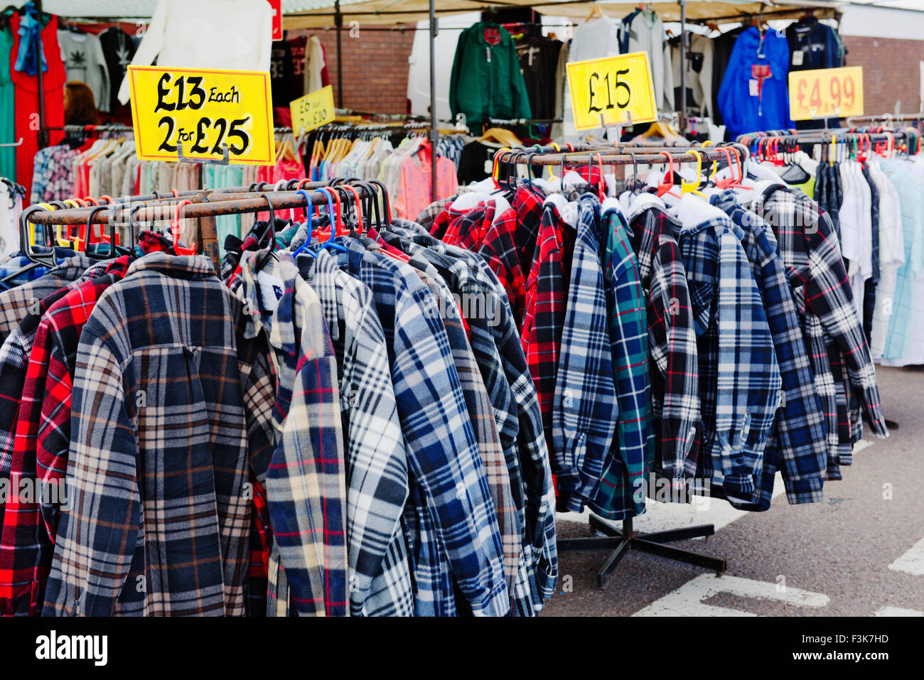 Outdoor market selling shirts Stock Photo