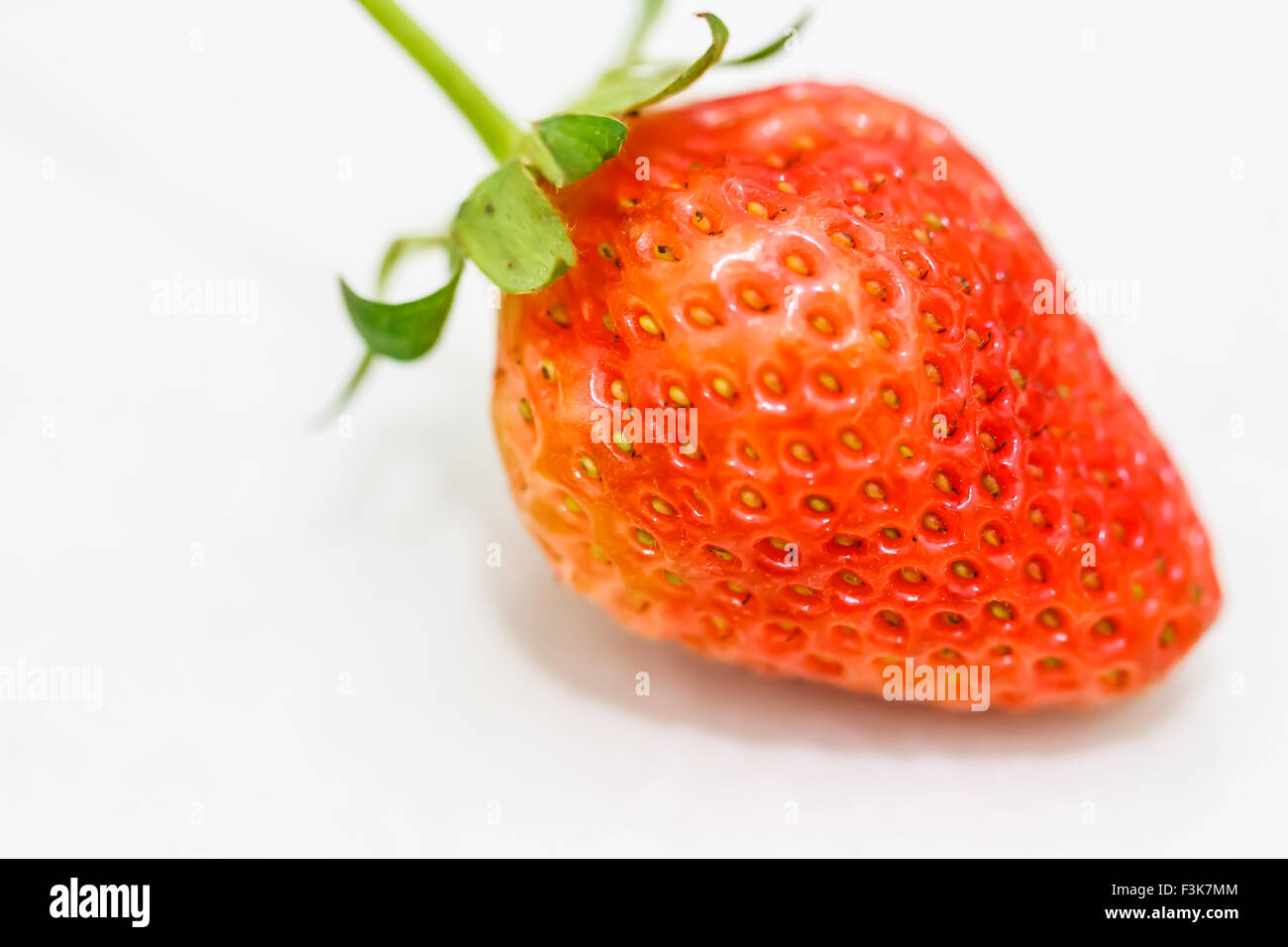 Strawberry berries on a white background Stock Photo - Alamy
