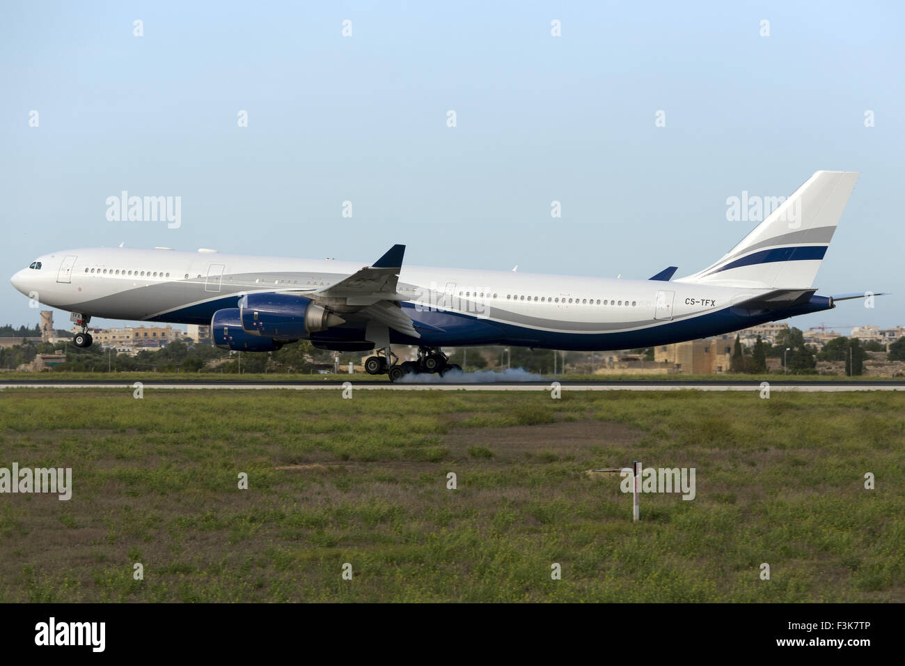 HiFly Airbus A340-500 landing runway 31 for Lufthansa Technik Servicing in Malta. Stock Photo