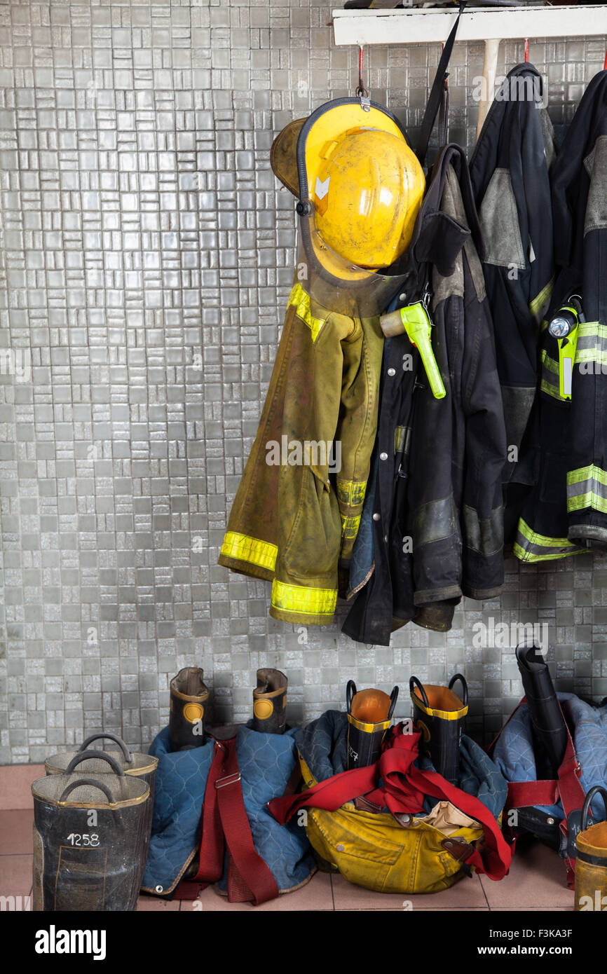 Firefighter Suits At Fire Station Stock Photo