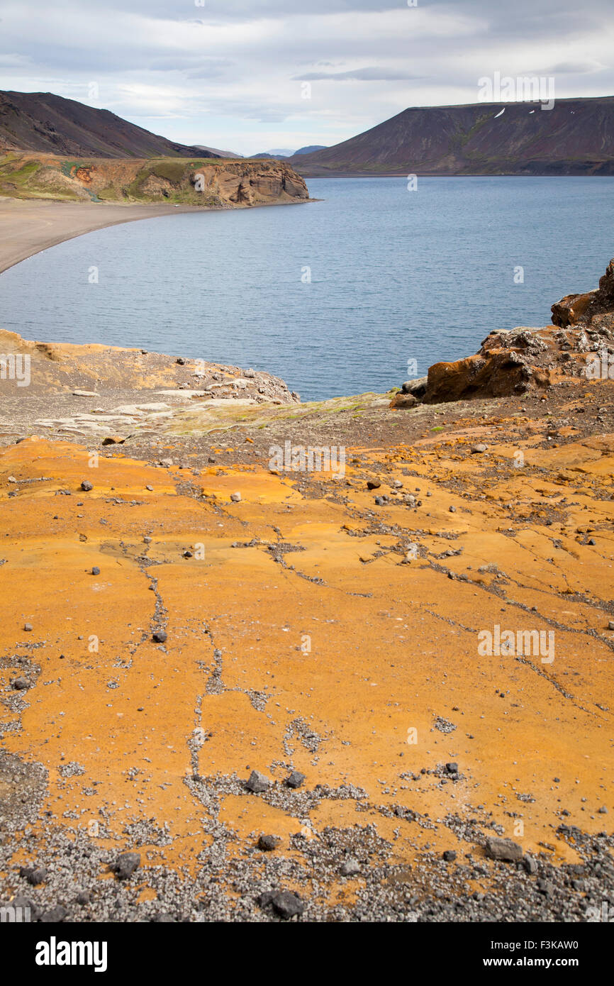 Brightly coloured volcanic rocks on the shore of Kleifarvatn lake, Reykjanes Peninsula, Iceland. Stock Photo