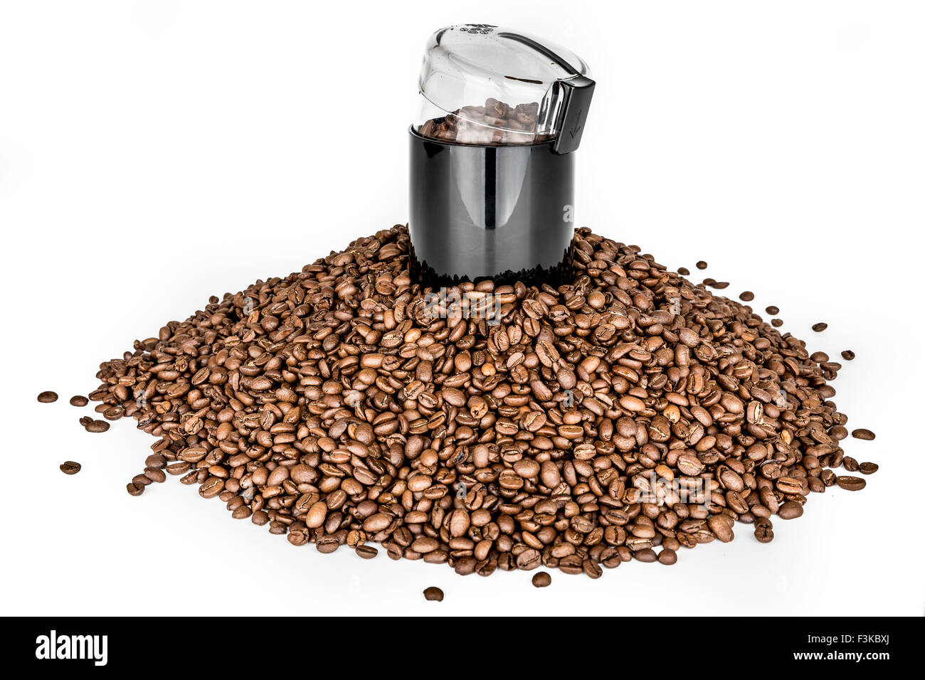 Coffee mill and pile of coffee beans Isolated Stock Photo Alamy