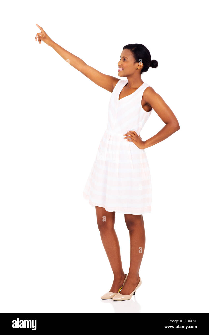 beautiful black woman pointing at empty space isolated on white Stock Photo