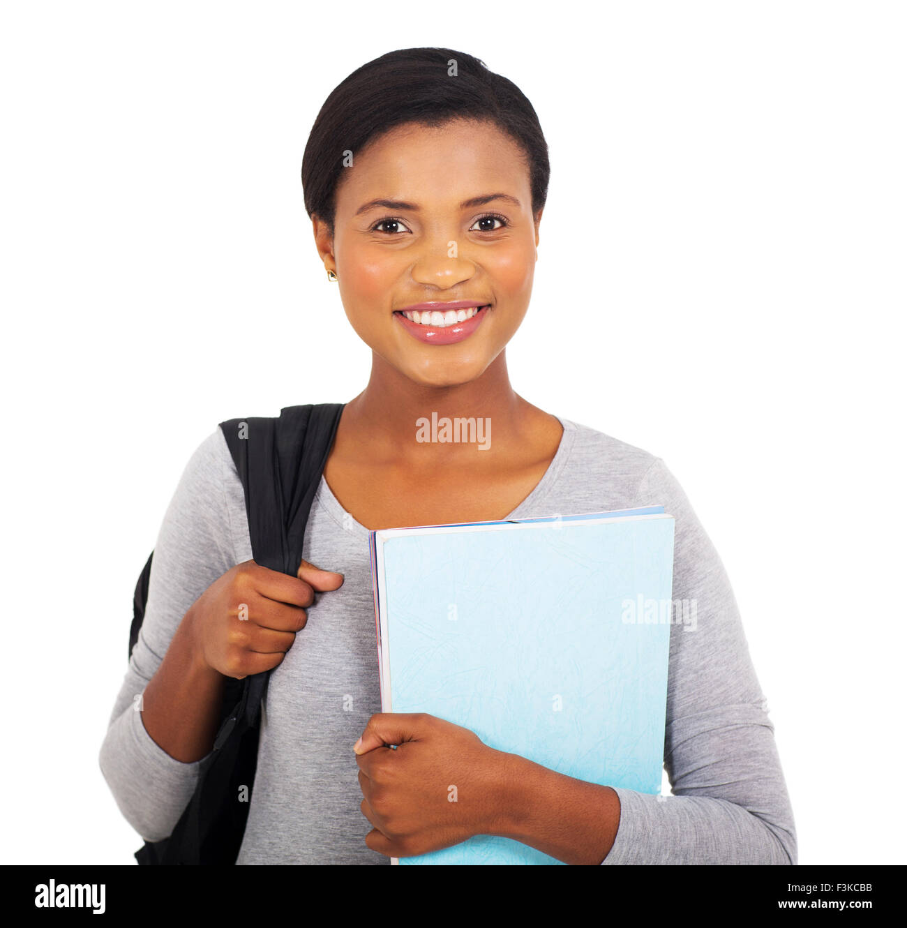 smiling young black college student on white background Stock Photo