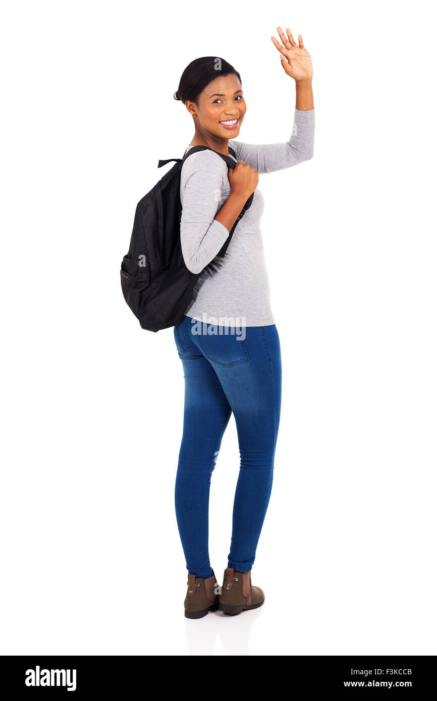 happy African American college student waving goodbye isolated on white background Stock Photo