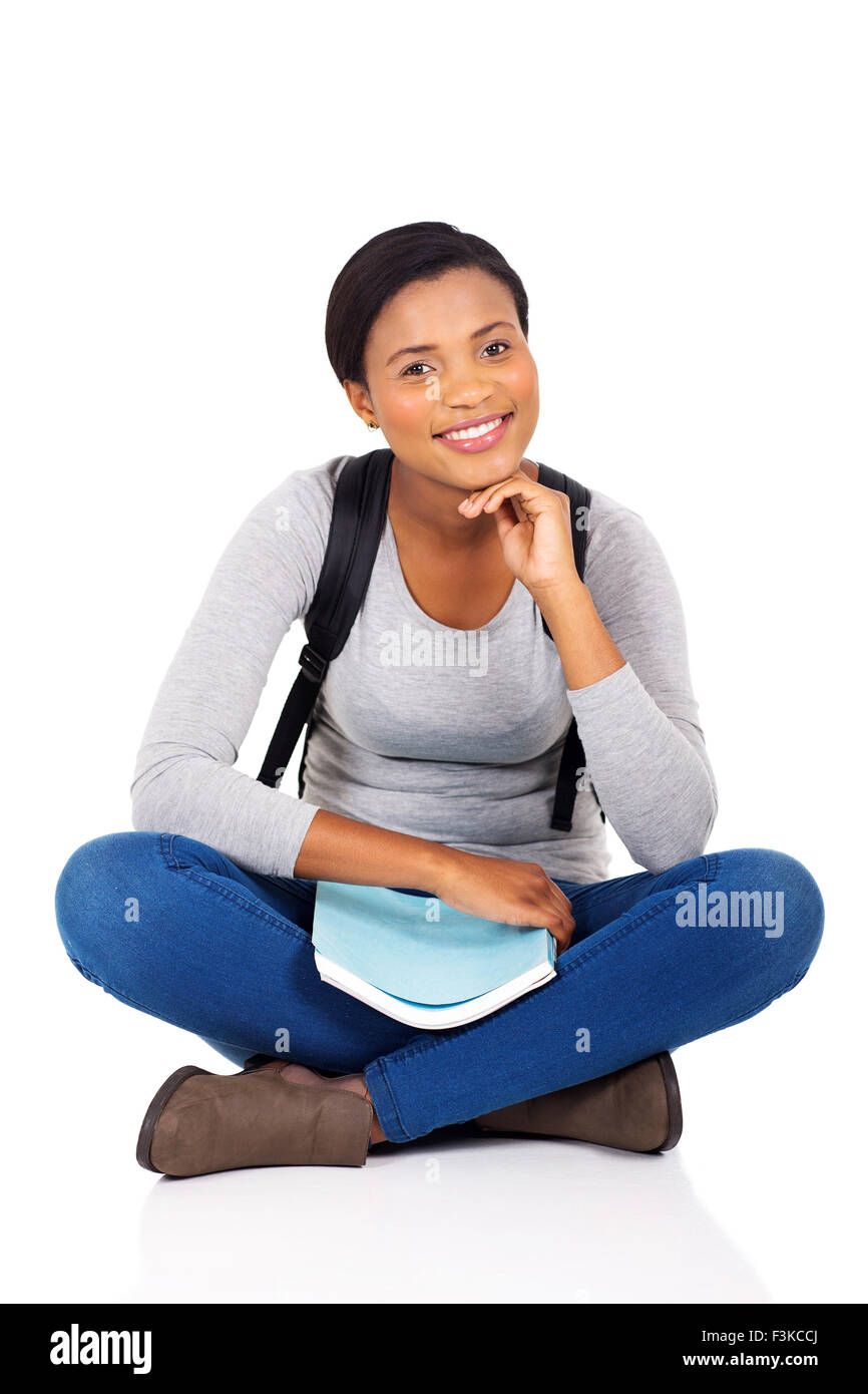 happy African female college student sitting on white background Stock ...