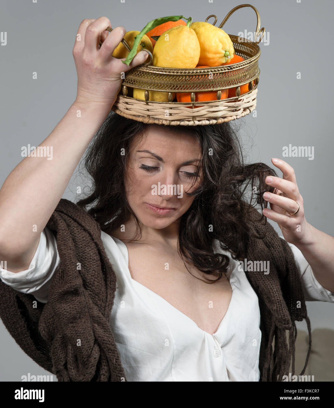 All 104+ Images lady with the fruit on her head Superb