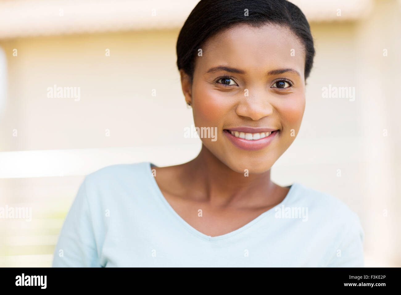 Happy young black woman hi-res stock photography and images - Alamy