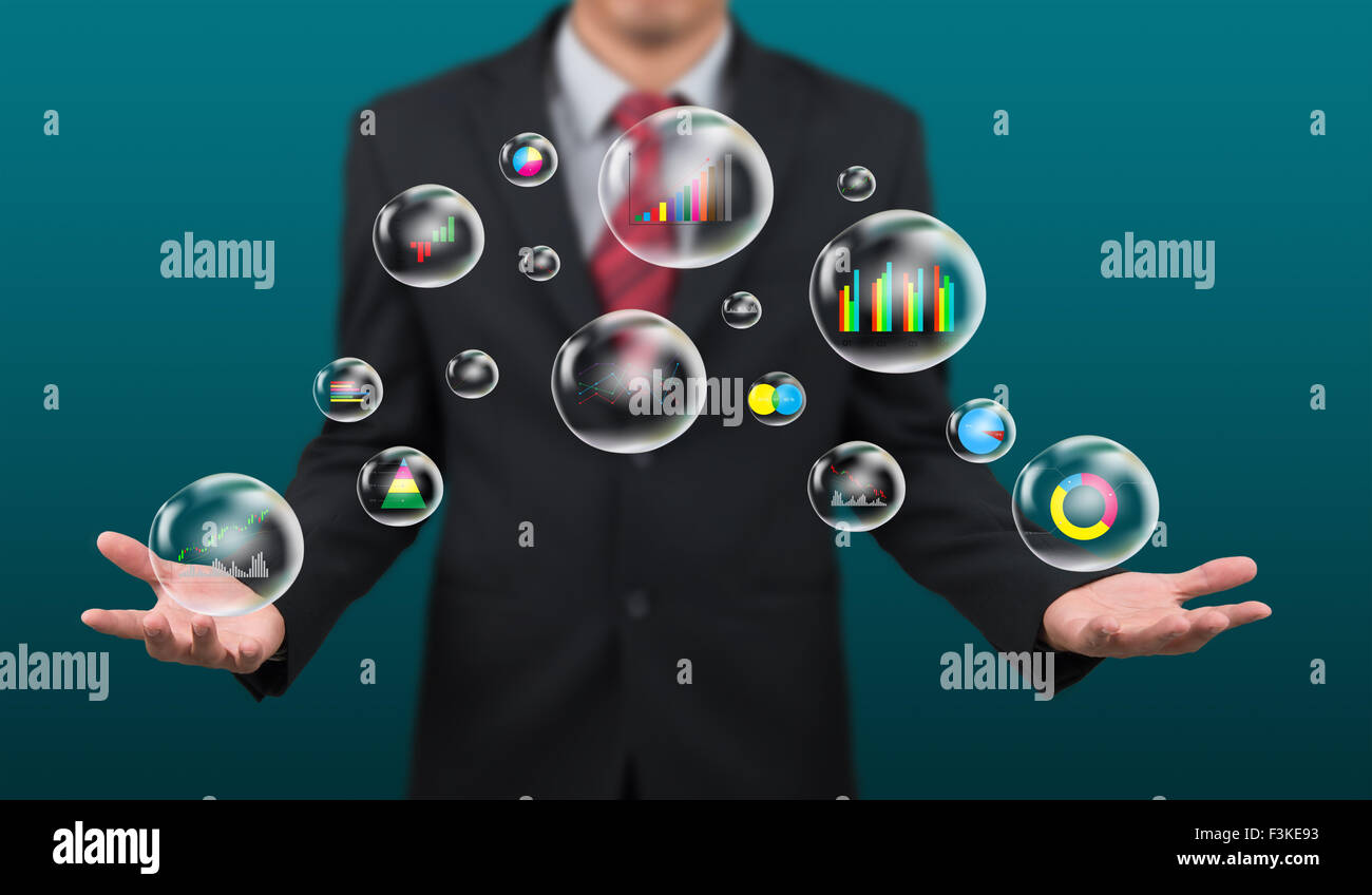 man show business graph in bubble on hand Stock Photo