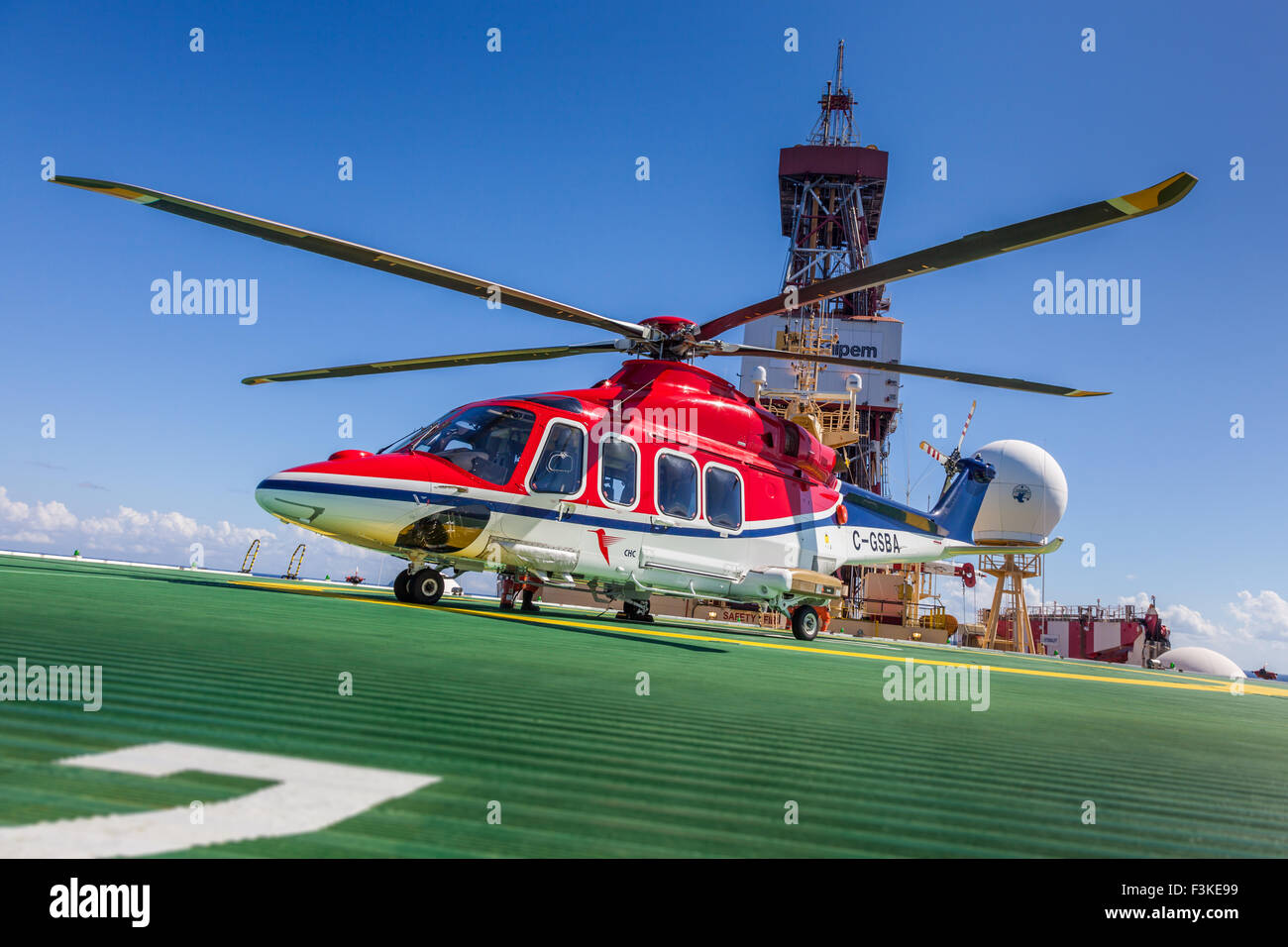 Helicopter on ships deck Stock Photo