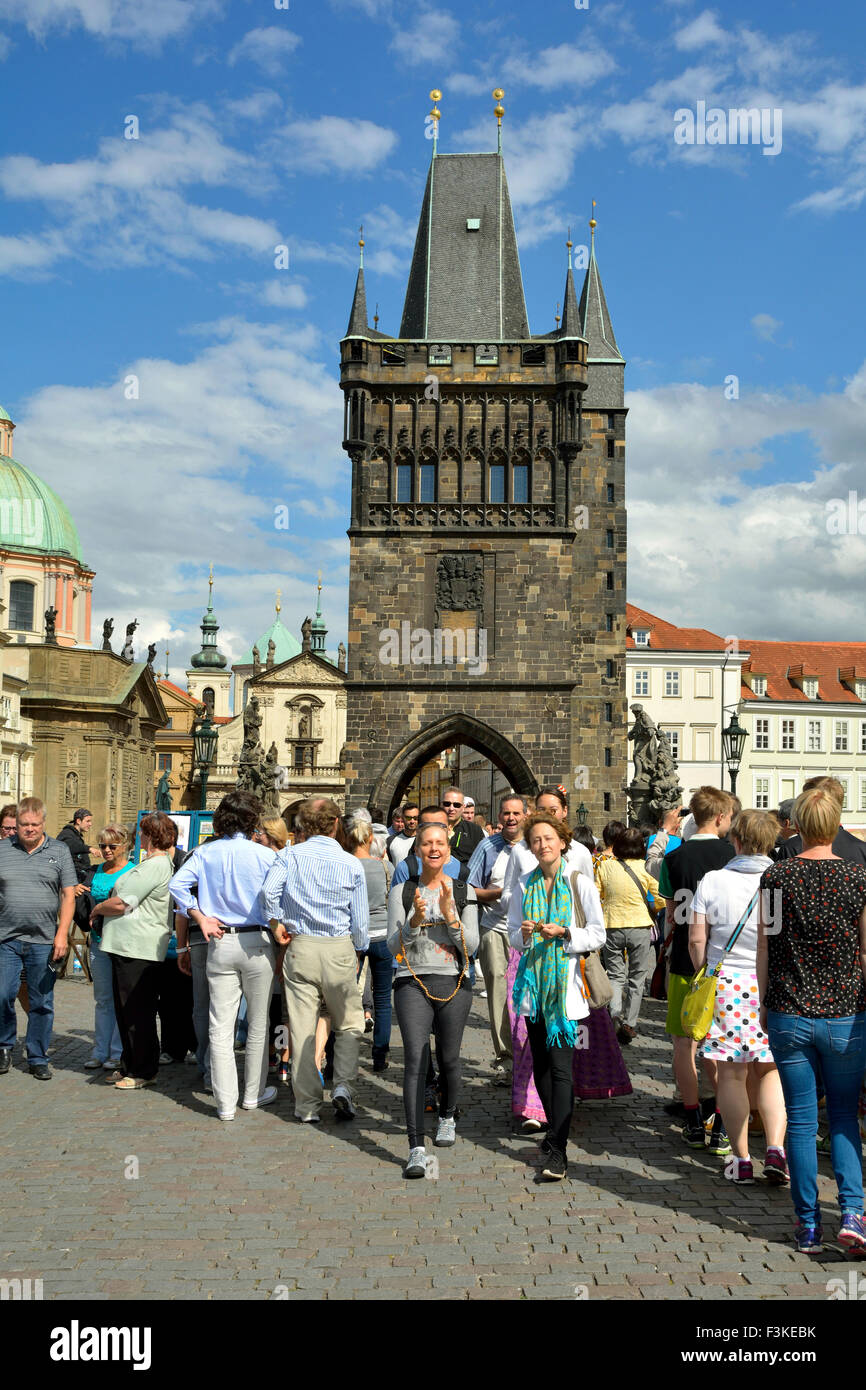 Tourists on the Charles Bridge of Prague in the Czech Republic. Stock Photo