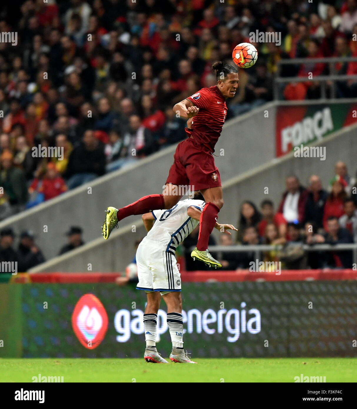 Braga, Portugal. 8th Oct, 2015. Portugal's Bruno Alves (Top) competes during the Euro 2016 qualifying football match between Portugal and Denmark in Braga, Portugal, on Oct. 8, 2015. Portugal won 1-0. © Zhang Liyun/Xinhua/Alamy Live News Stock Photo