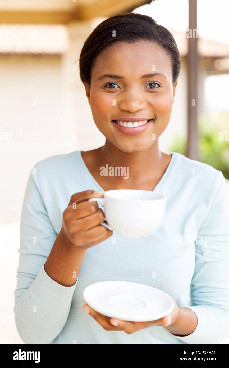 portrait of young African woman drinking coffee at home Stock Photo - Alamy