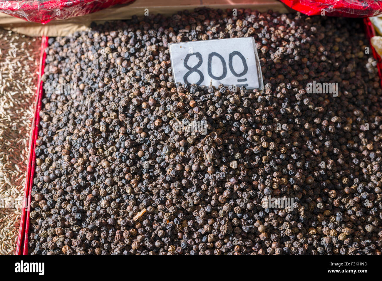 Black pepper is displayed in the Old Delhi spice market Stock Photo