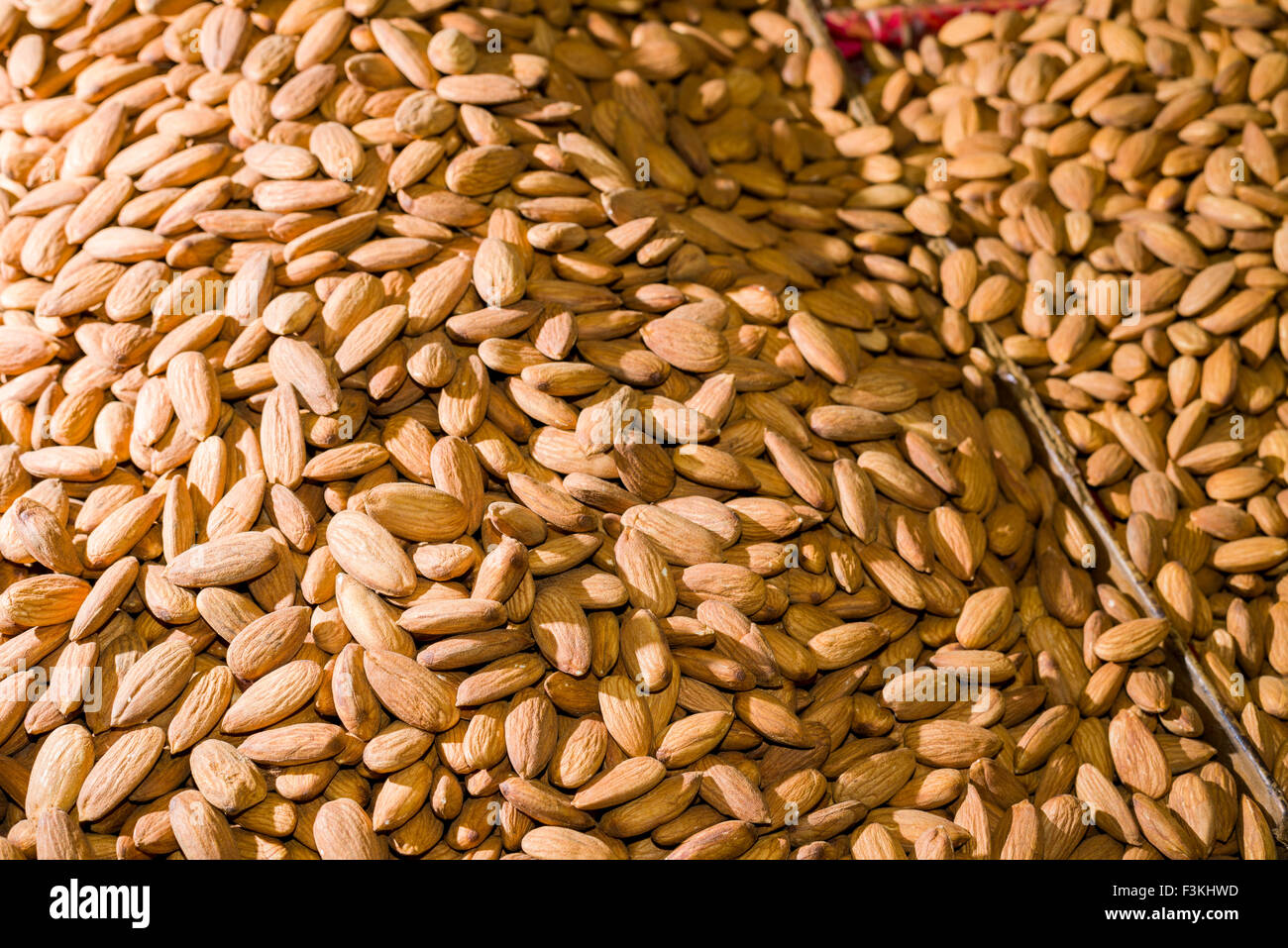 Almonds are displayed in the Old Delhi spice market Stock Photo