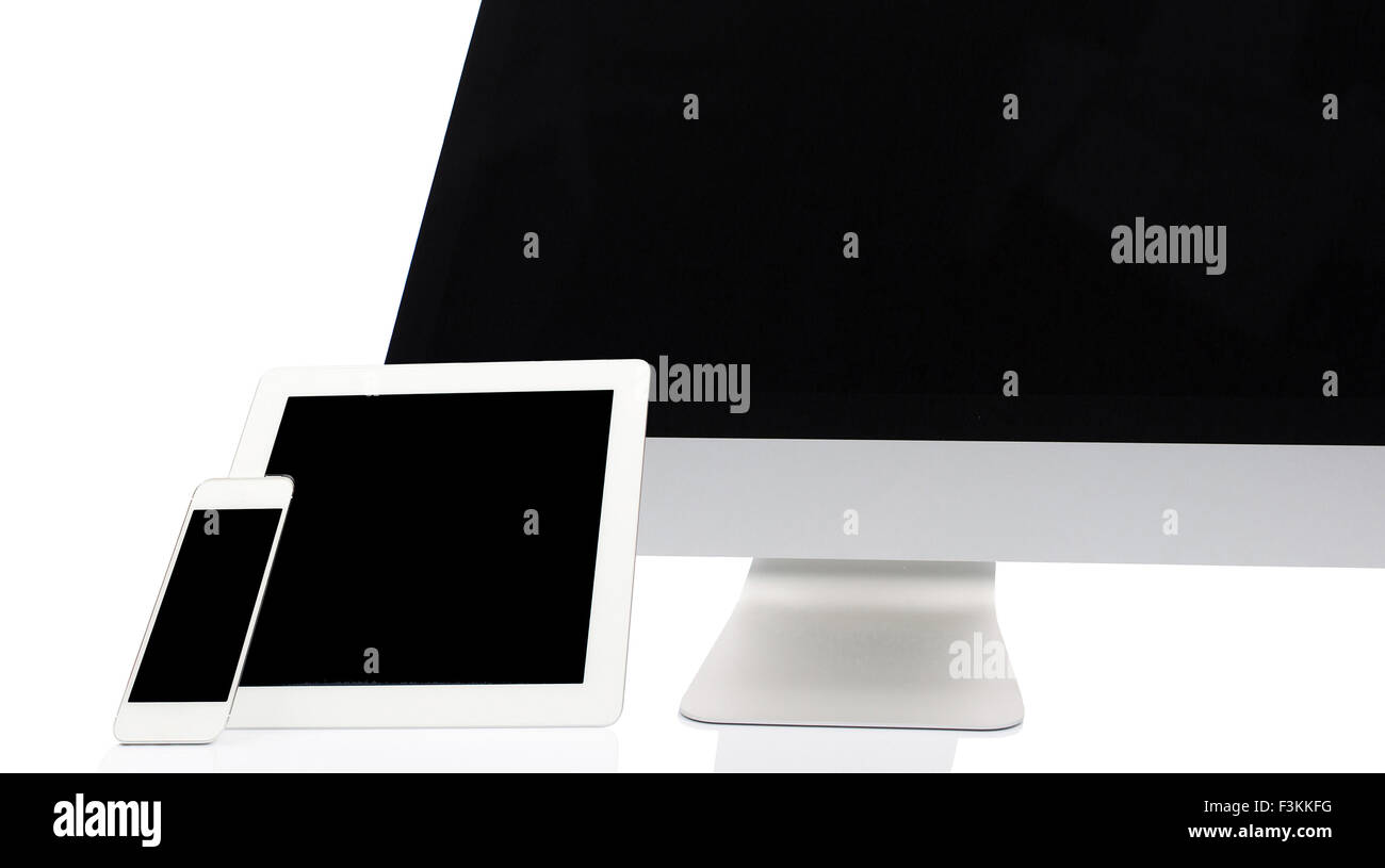 Computer, Tablet and Smartphone on White Background Stock Photo