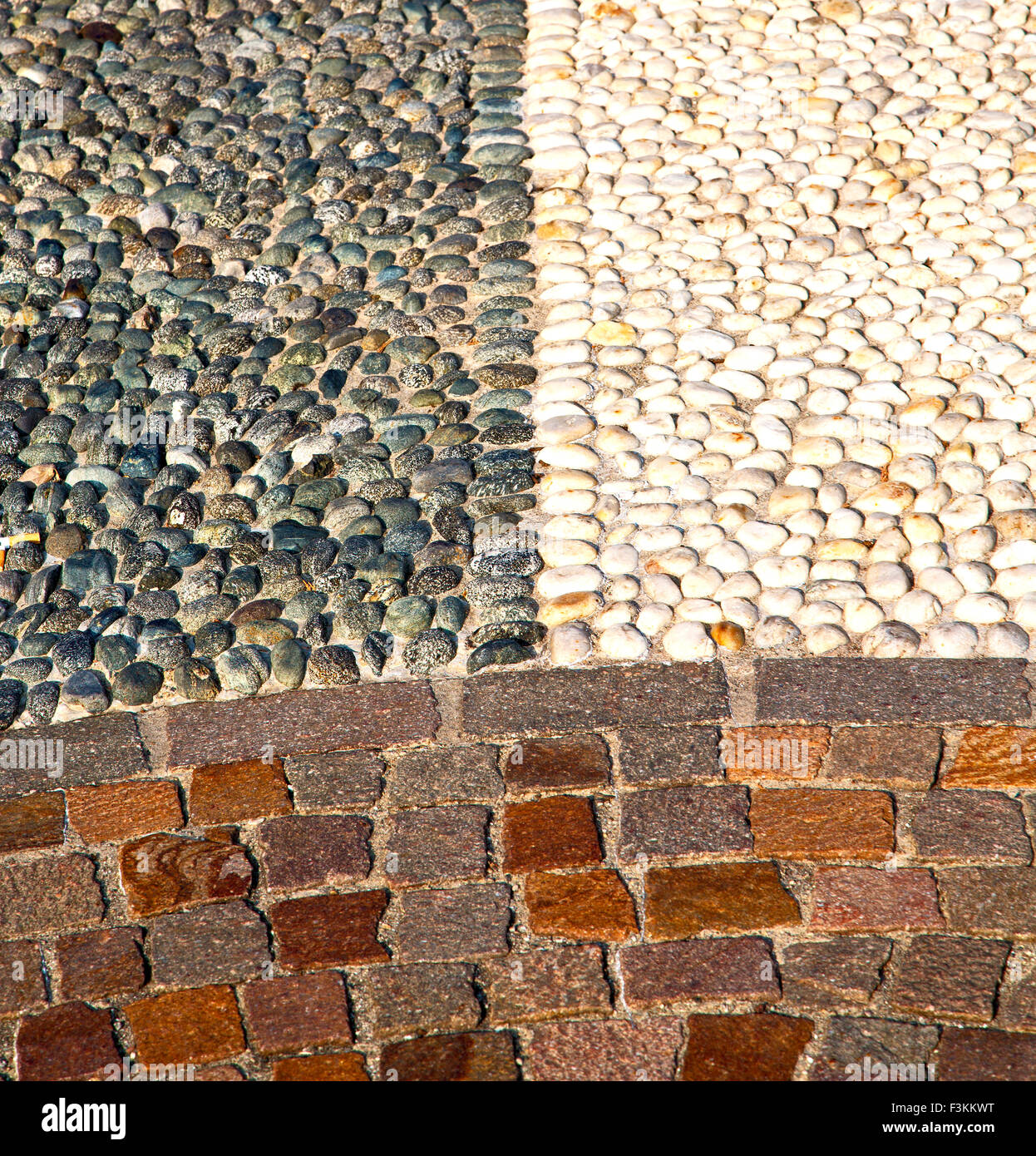 in mozzate street lombardy italy varese abstract pavement of a curch ...