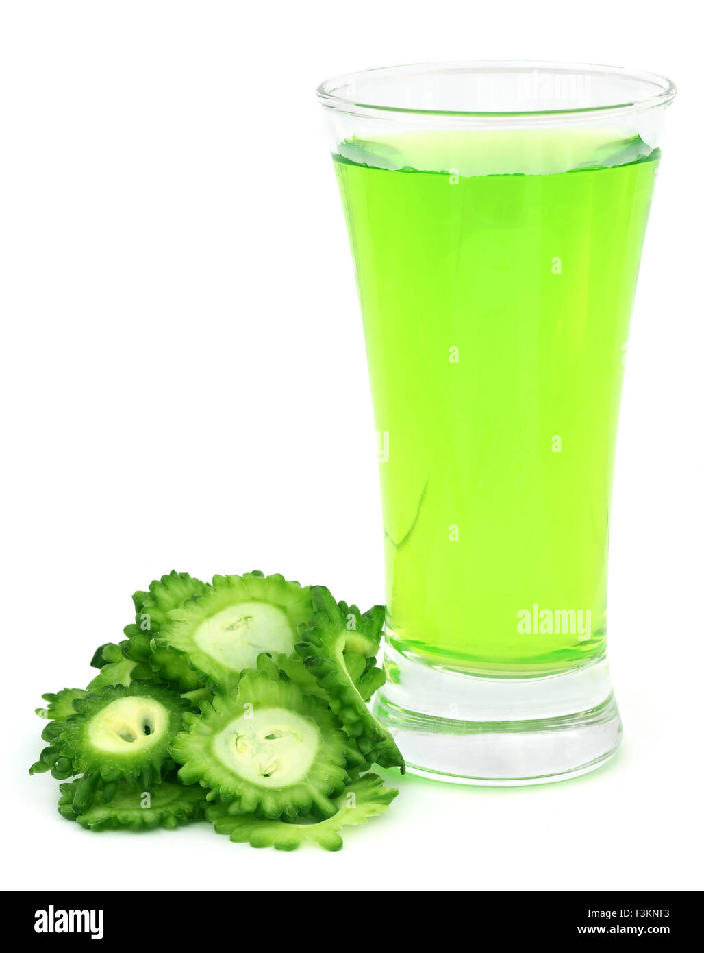 Herbal juice of green momodica over white background Stock Photo