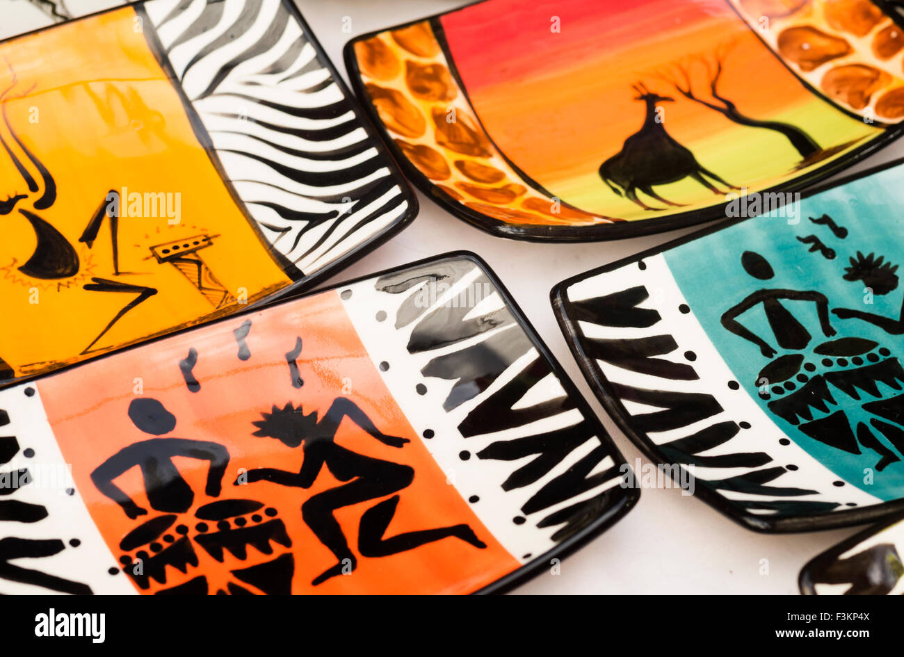 Handpainted plates with African designs and animal prints at the Market