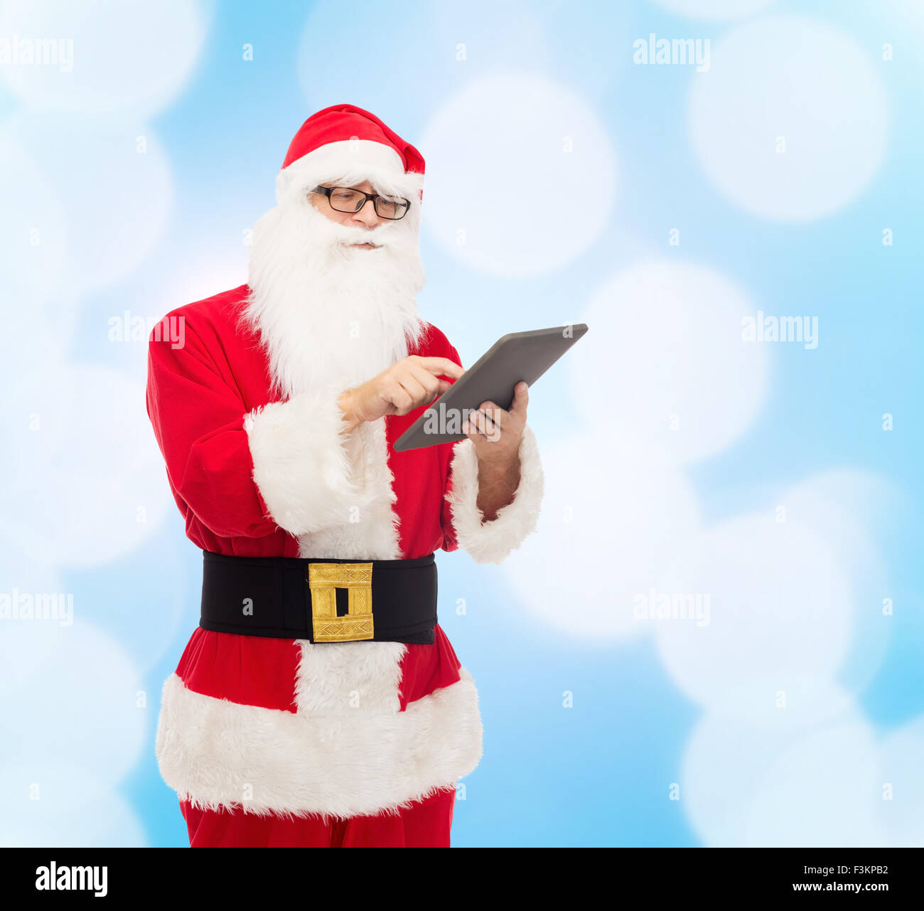 man in costume of santa claus with tablet pc Stock Photo - Alamy