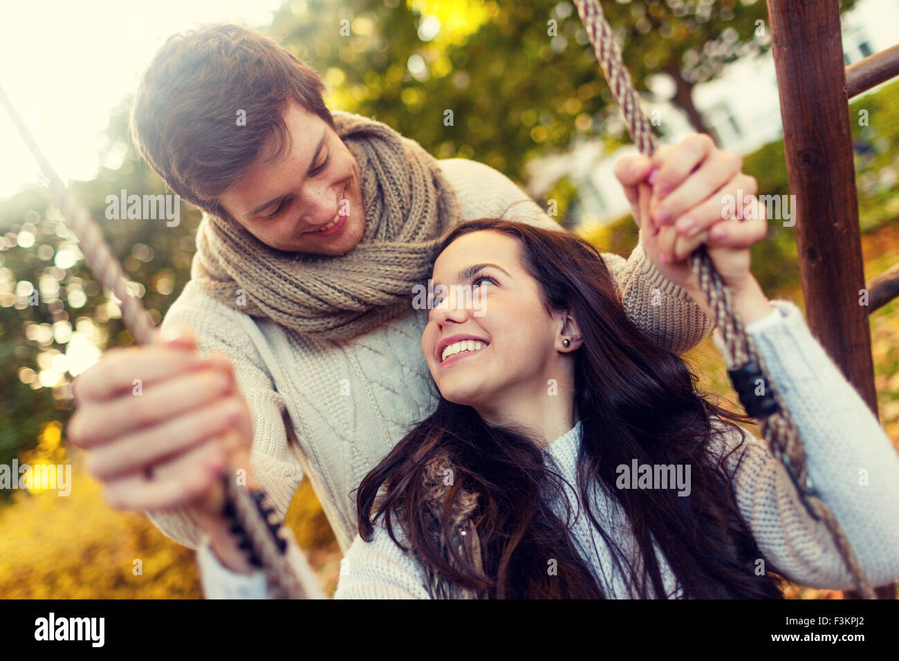smiling couple hugging in autumn park Stock Photo - Alamy