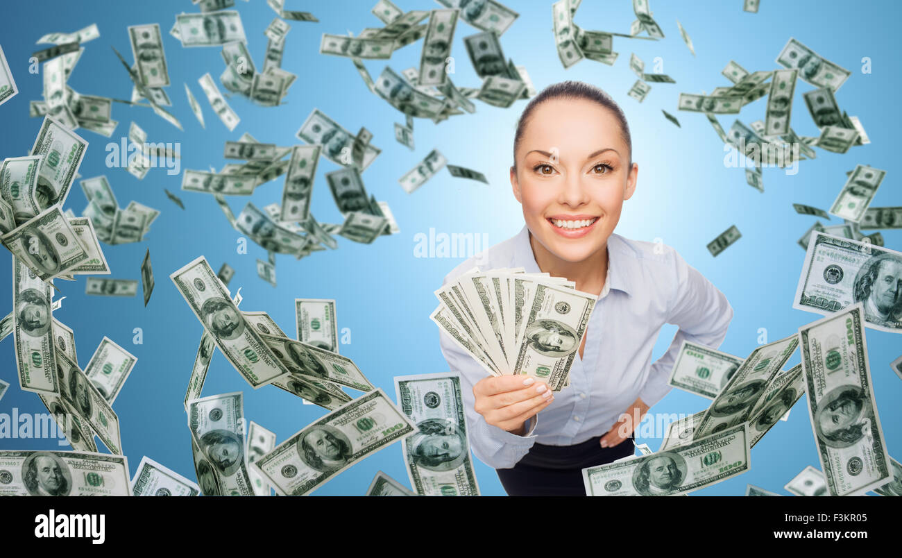 smiling businesswoman with dollar cash money Stock Photo - Alamy