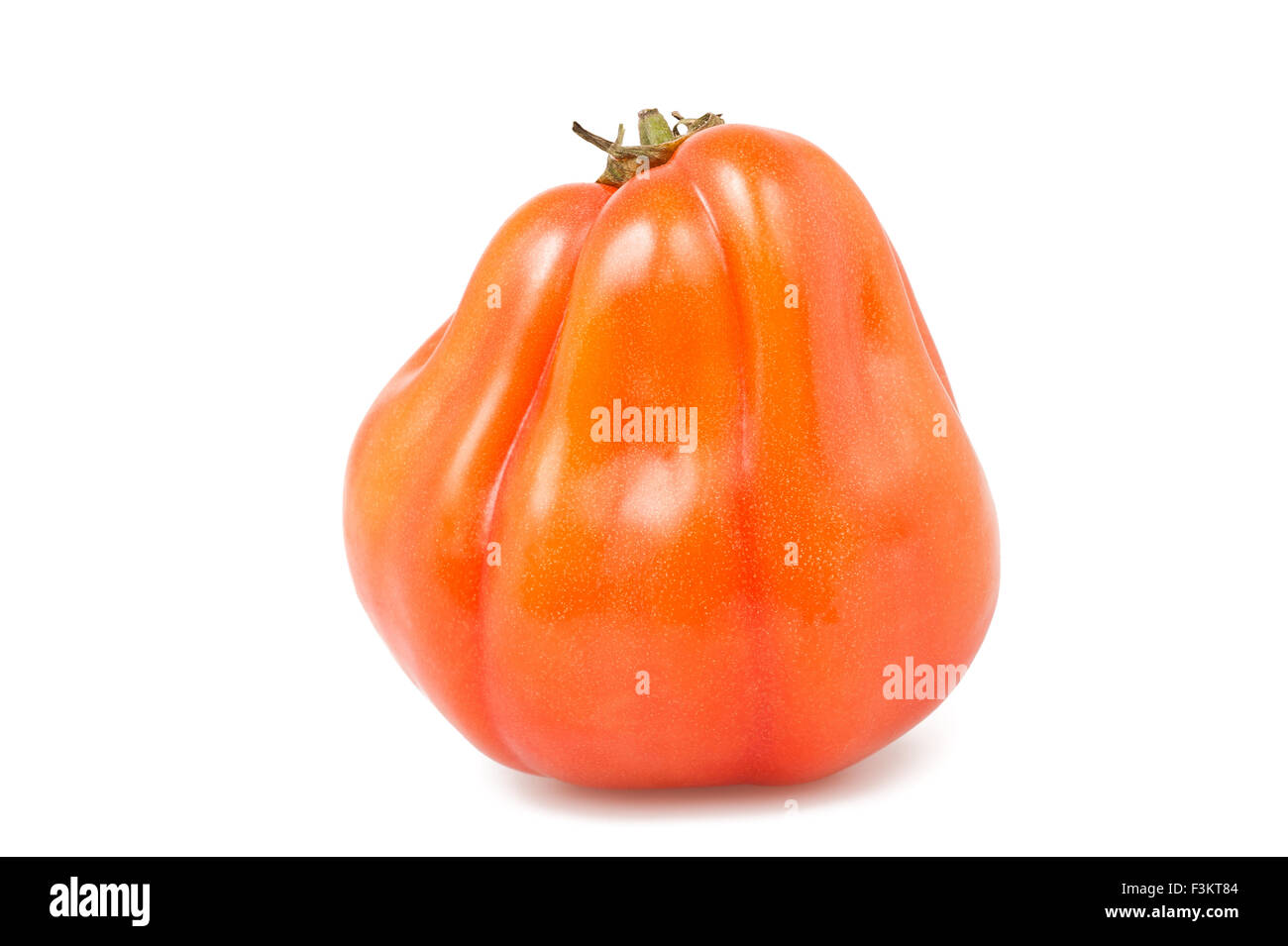 Oxheart or beefsteak tomato on white Stock Photo Alamy