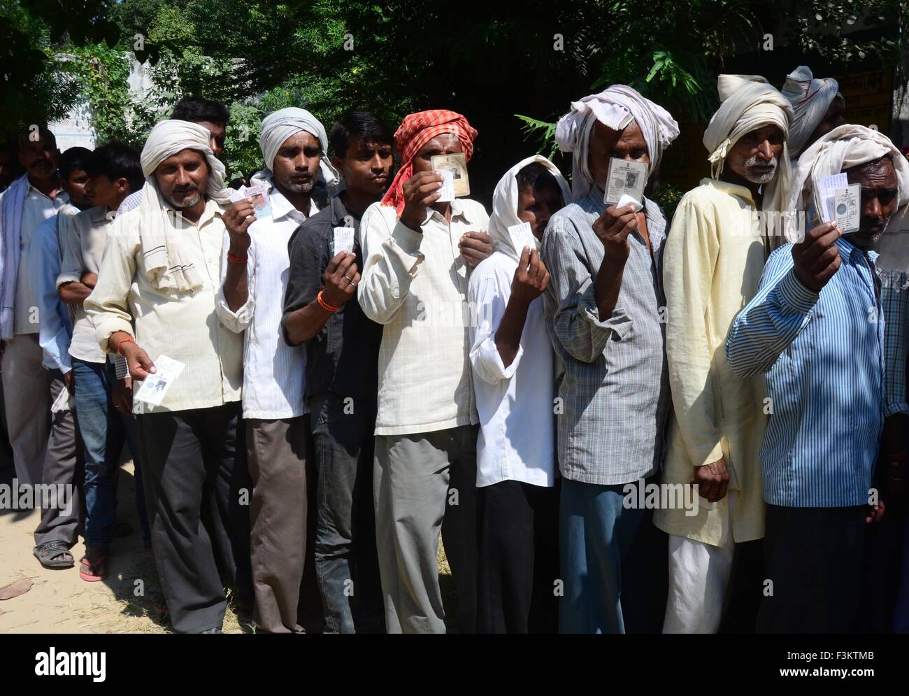 Allahabad, India. 09th Oct, 2015. People in a queue to cast their votes ...