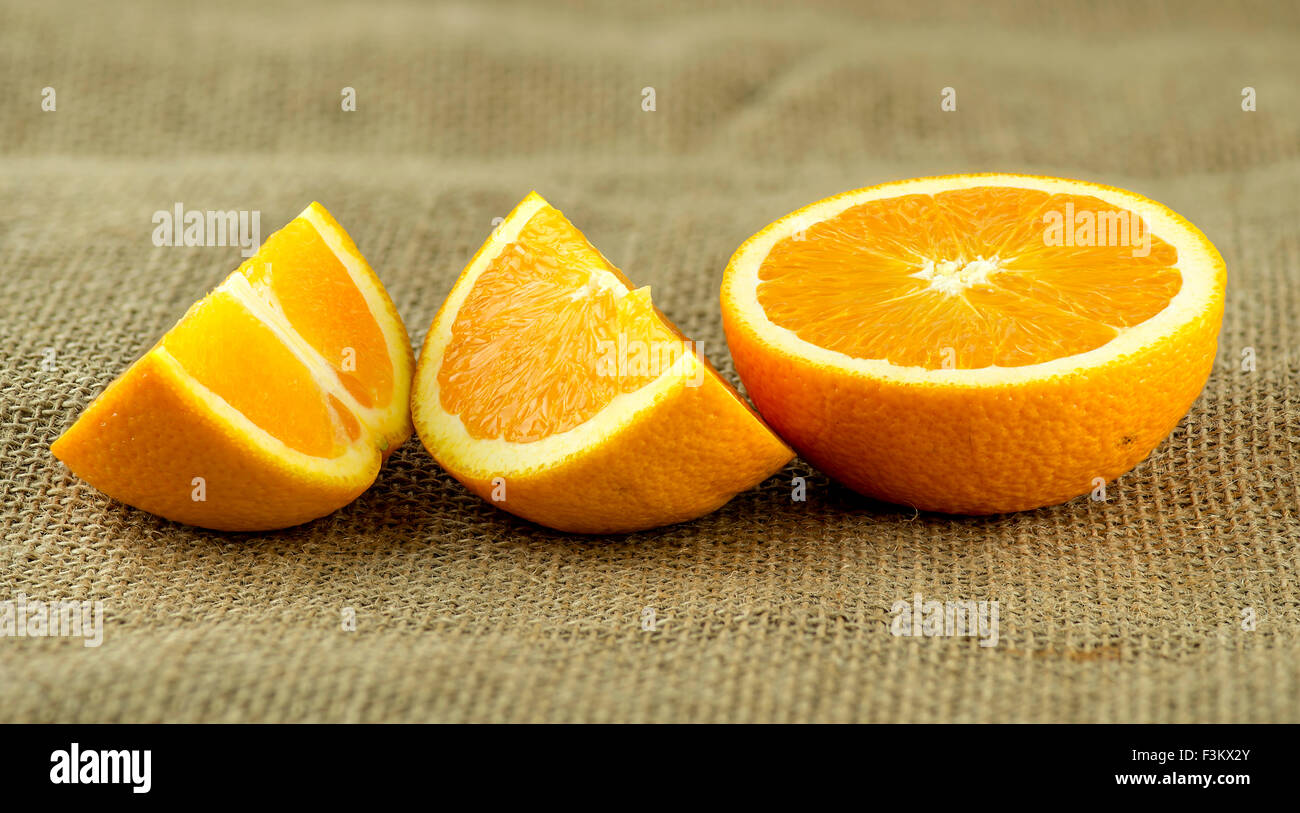 Perfectly Ripe Orange Perfect chopped pieces of organic ripe orange fruit Stock Photo - Alamy
