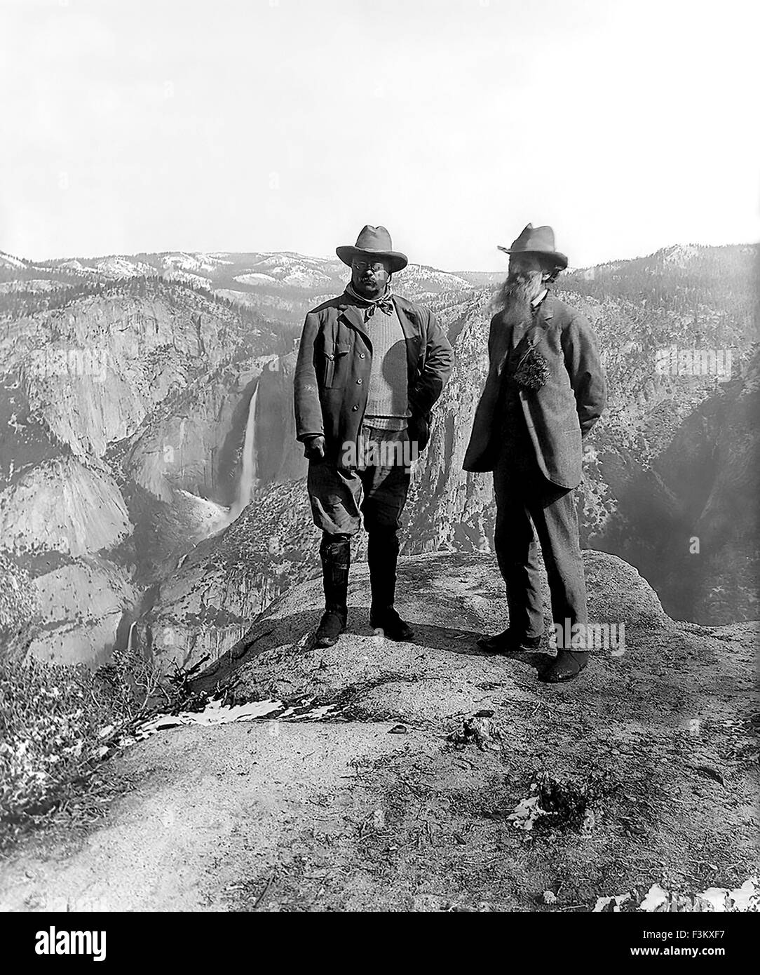 JOHN MUIR pioneer conservationist at right with US President Theodore Roosevelt on Glacier Point in Yellowstone National Park in 1906. The Yosemite Falls are in the background. Photo Underwood and Underwood Stock Photo