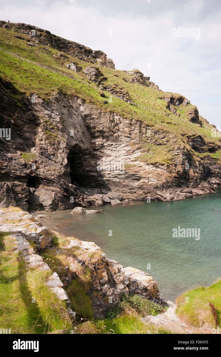 Caves Under The Ruins Of Tintagel castle Cornwall England UK Stock Photo