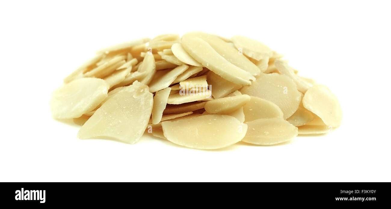 Isolated macro of a pile of thin almond slices Stock Photo