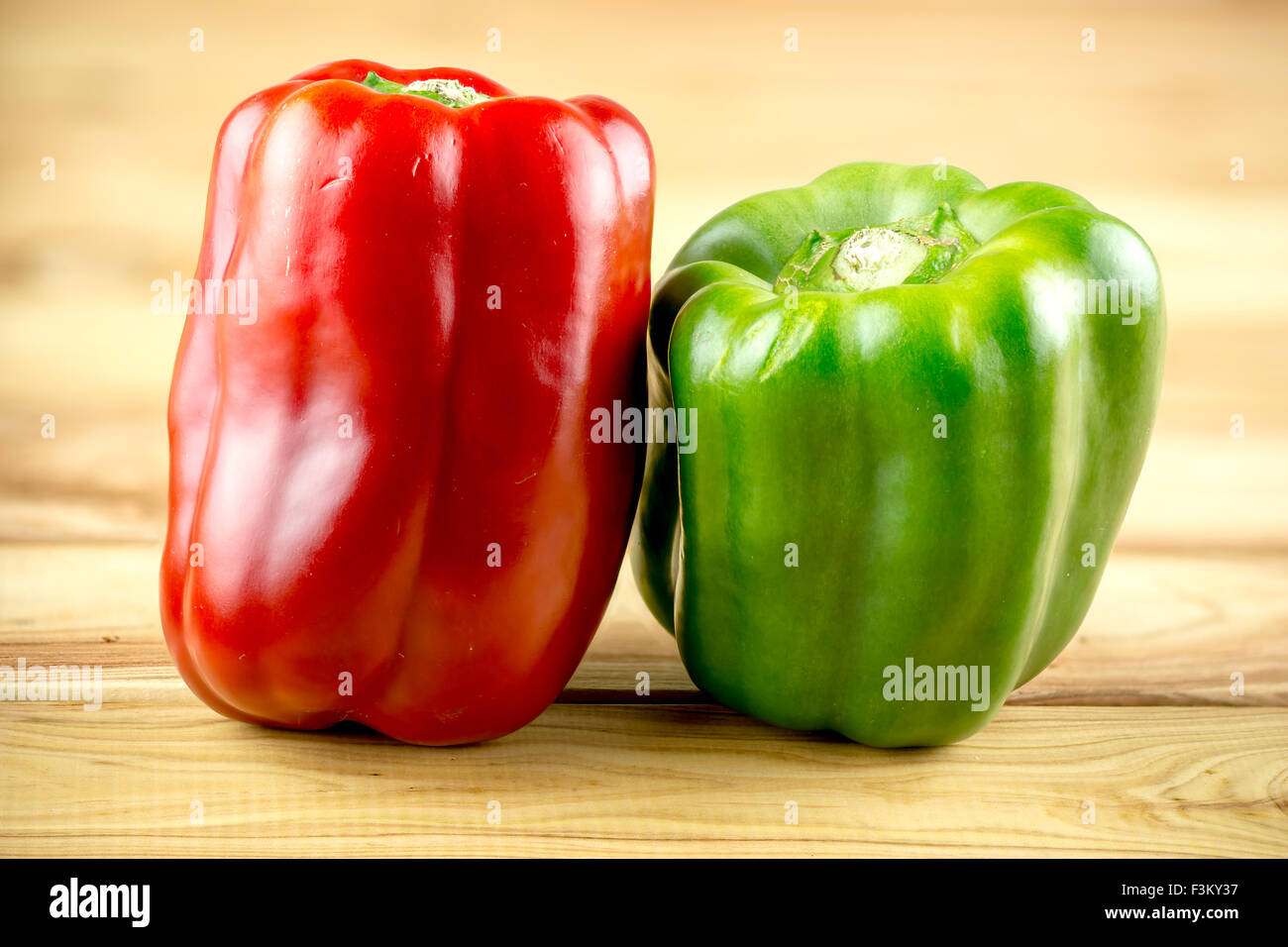 Macro closeup of organic peppers on rustic background Stock Photo