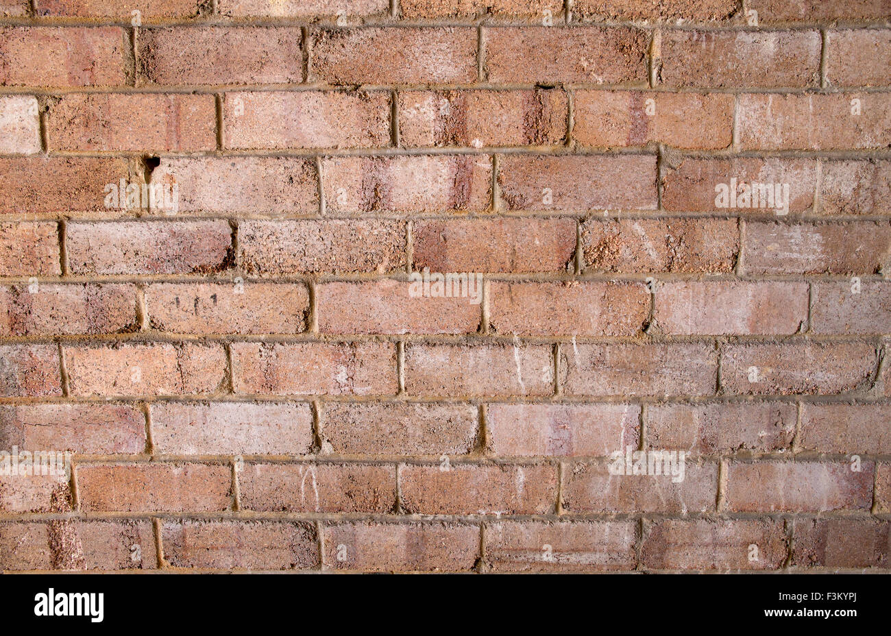 Flat aged red brick wall background texture in The Rocks, Sydney, Australia Stock Photo