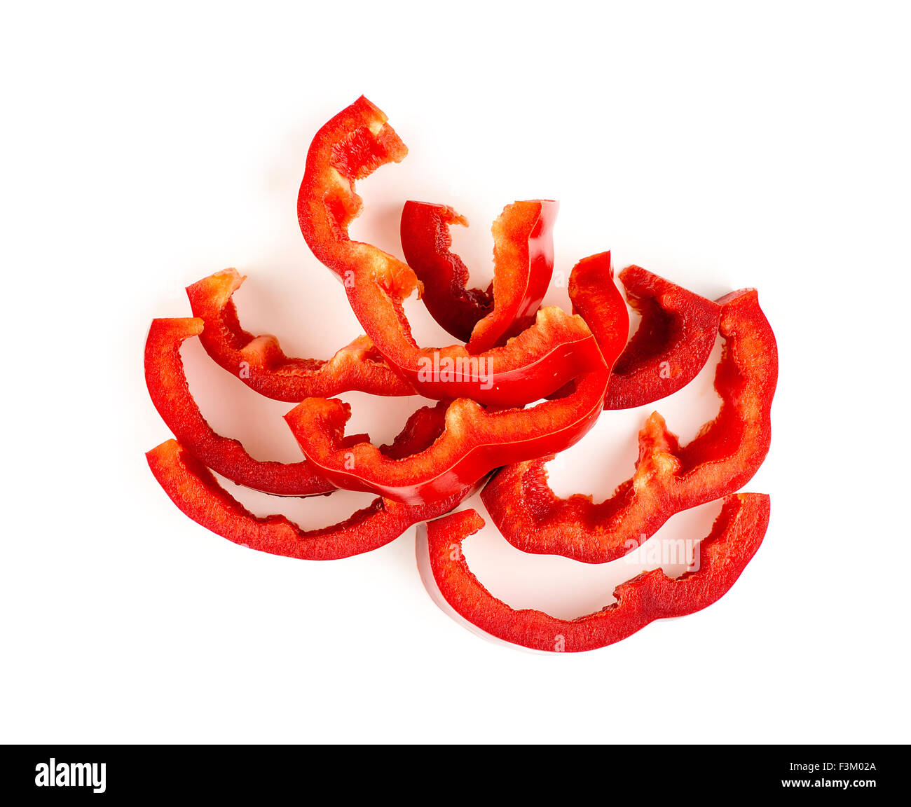 Juicy red bell pepper cut up and isolated on white Stock Photo