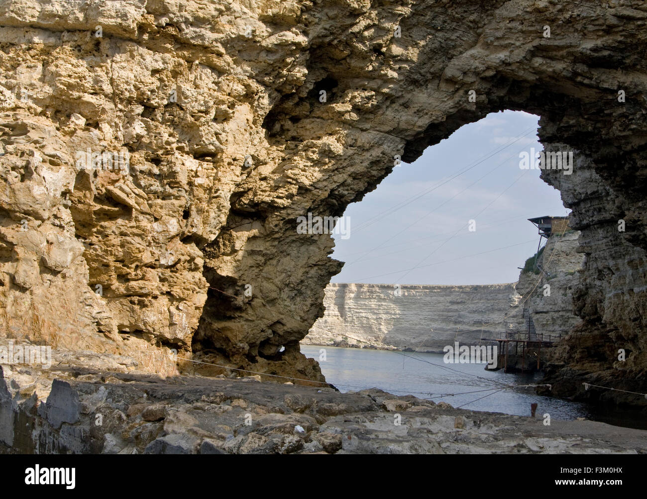 Sea landscape with rock on shore, recorded in place Tarhankut in region Crimea on Black sea. Stock Photo